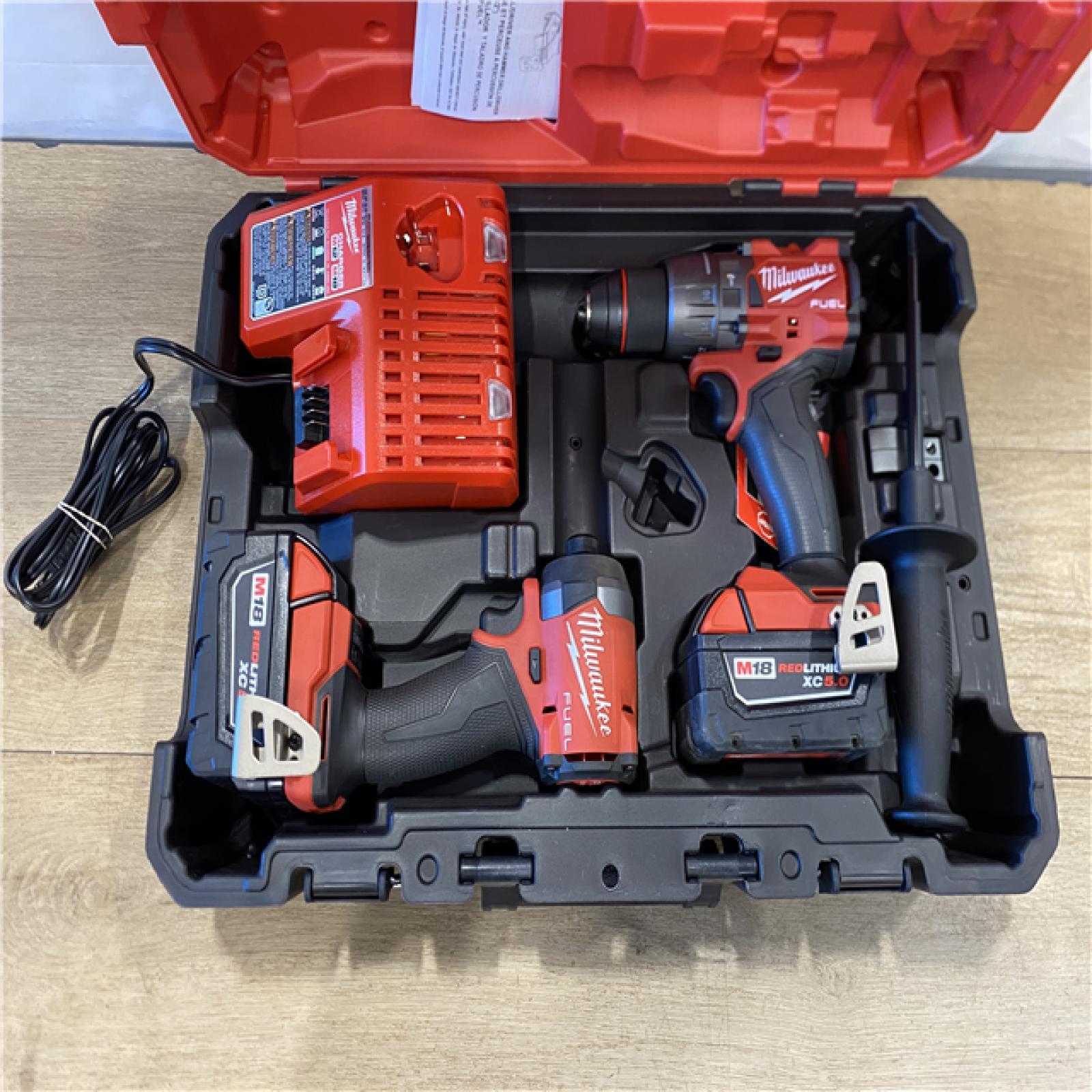 AS-IS Milwaukee FUEL 18V Lithium-Ion Brushless Cordless Hammer Drill and Impact Driver Combo Kit