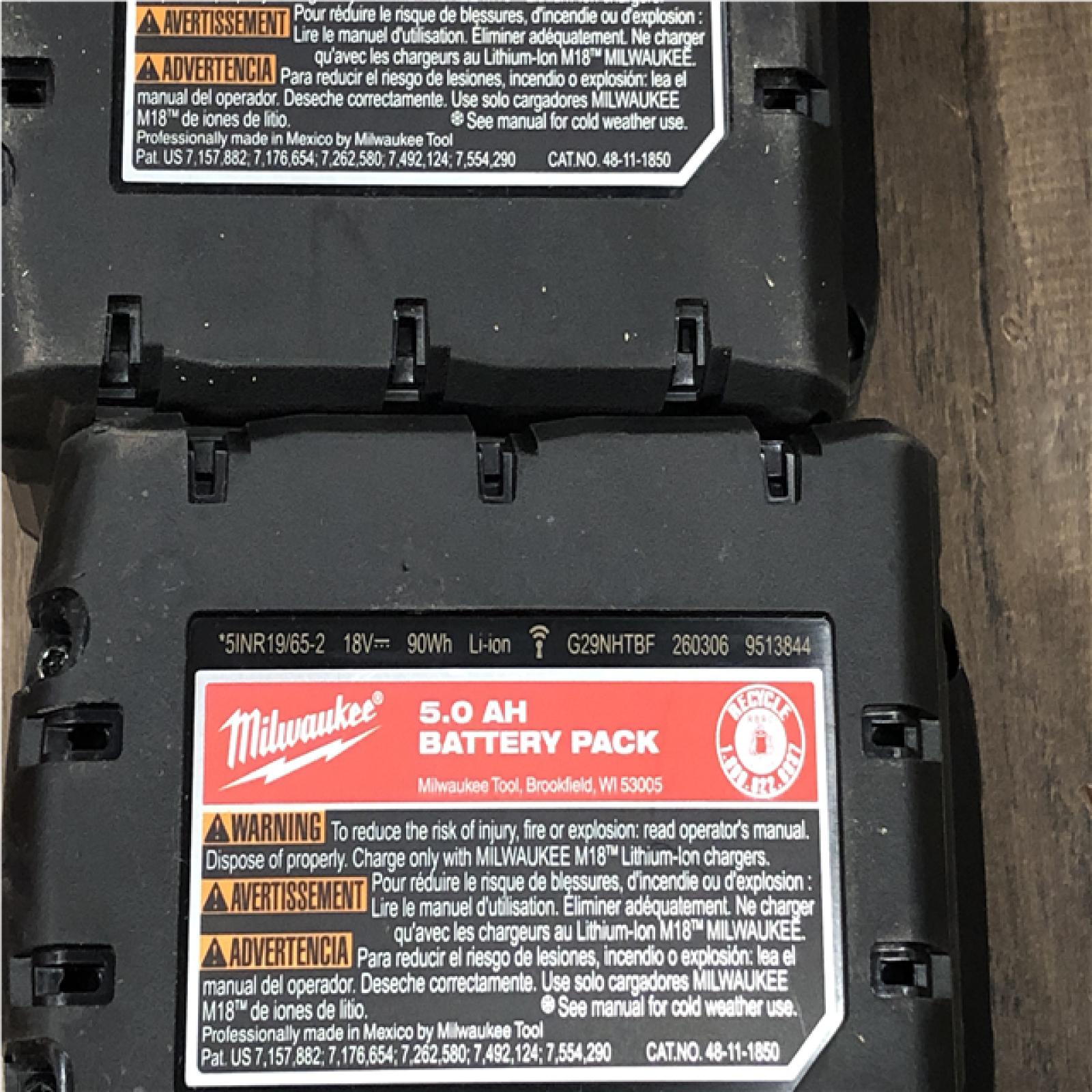 AS-IS Milwaukee 18-Volt Lithium-Ion XC Starter Kit with (2) 5.0Ah Batteries and Charger