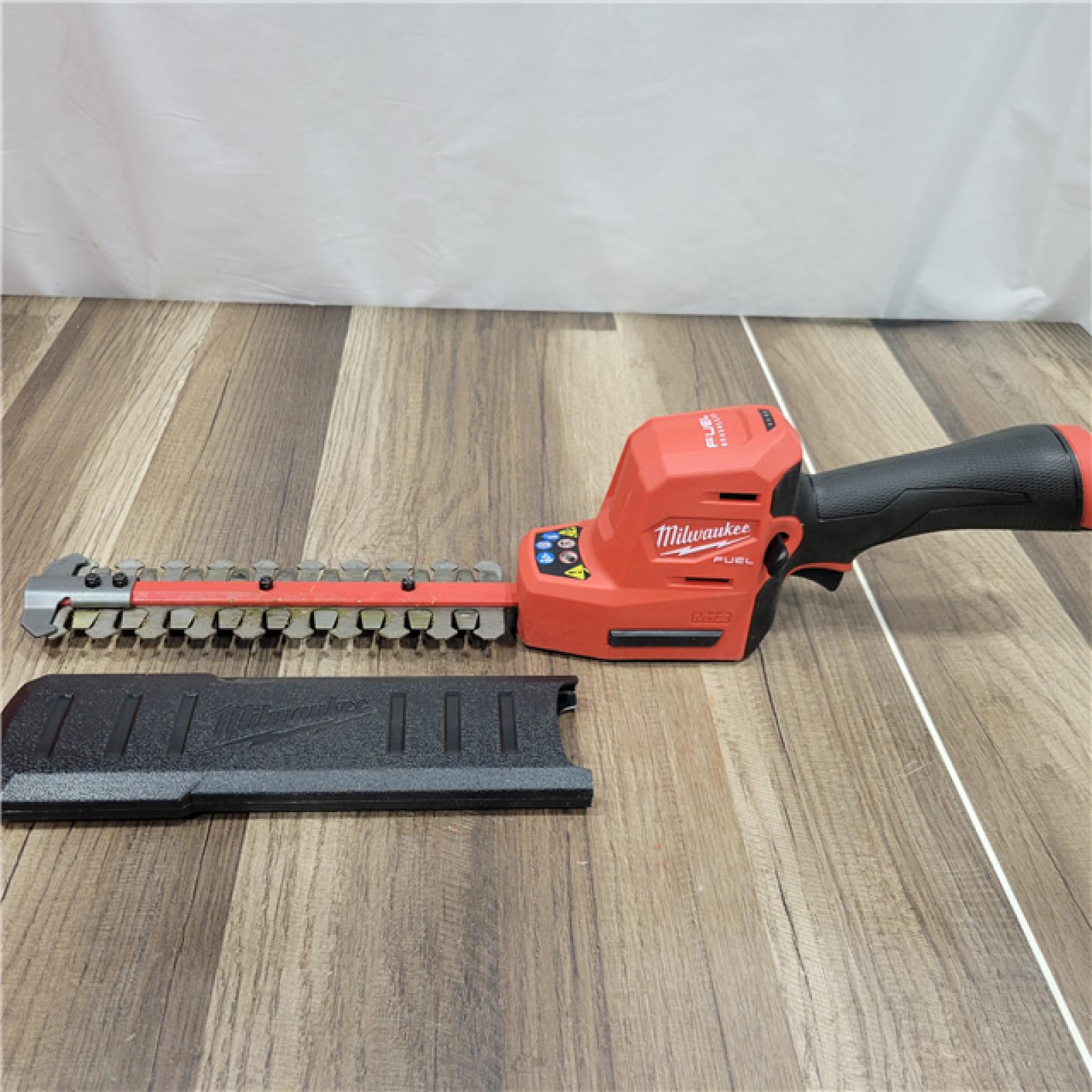 AS-IS Milwaukee M12 FUEL 8 in. 12V Lithium-Ion Brushless Cordless Battery Hedge Trimmer (Tool-Only)