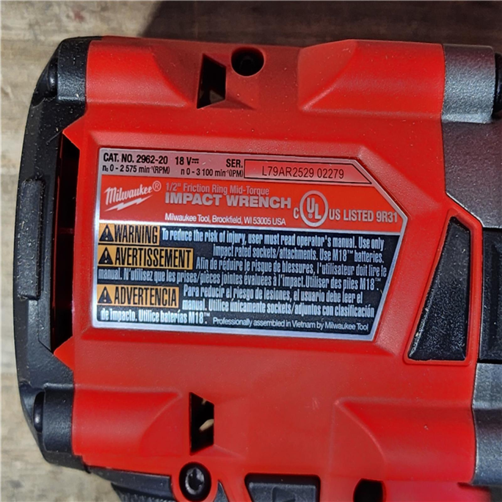 HOUSTON LOCATION - AS-IS (APPEARS LIKE NEW) Milwaukee 2962-20  M18 18V Fuel 1/2 Mid-Torque Impact Wrench Cordless Lithium-Ion Brushless (Tool-Only)