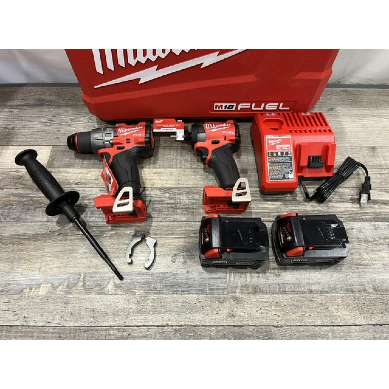 AS-IS Milwaukee FUEL 18V Lithium-Ion Brushless Cordless Hammer Drill and Impact Driver Combo Kit