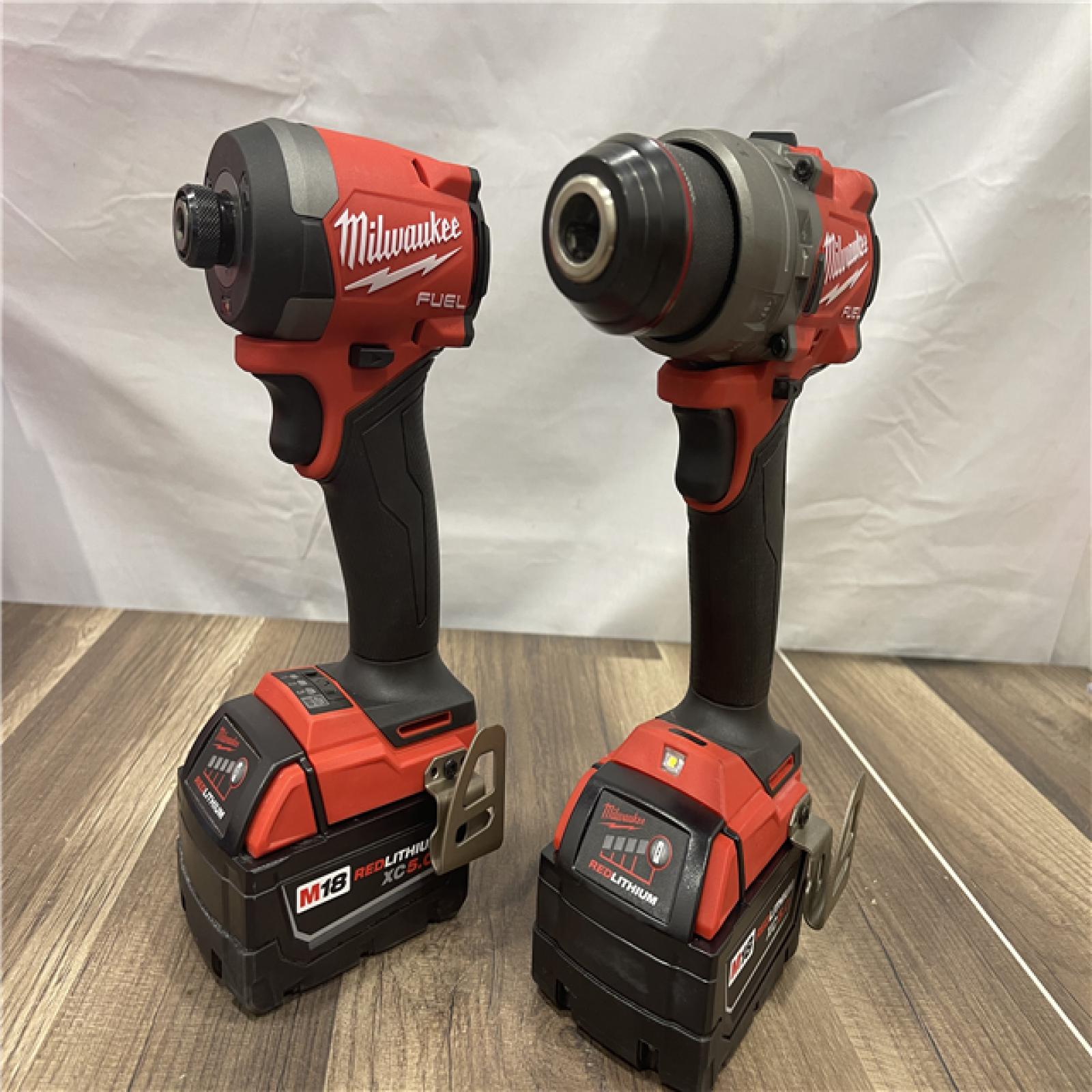 AS-IS Milwaukee FUEL 18V Lithium-Ion Brushless Cordless Hammer Drill and Impact Driver Combo Kit