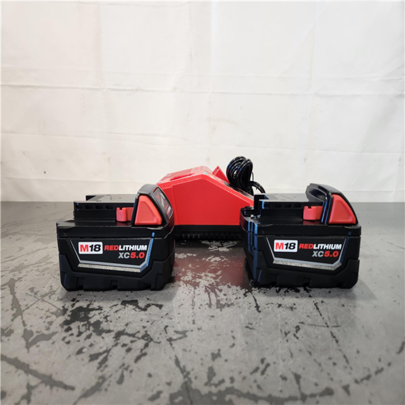 AS-IS- Milwaukee 18-Volt Lithium-Ion XC Starter Kit with Two 5.0Ah Batteries and Charger