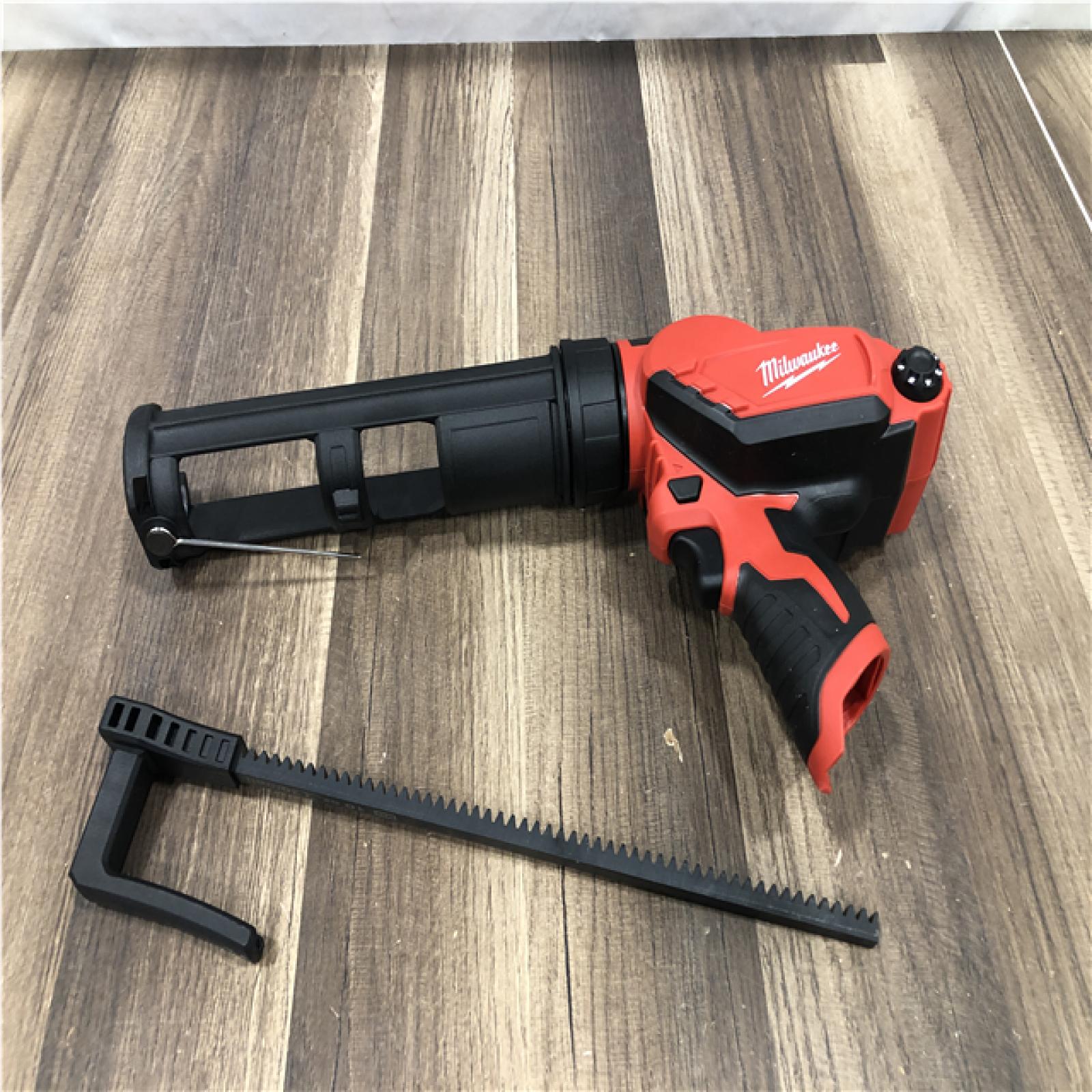 AS-IS Milwaukee 12V Lithium-Ion Cordless 10 oz. Adhesive and Caulk Gun (Tool-Only)