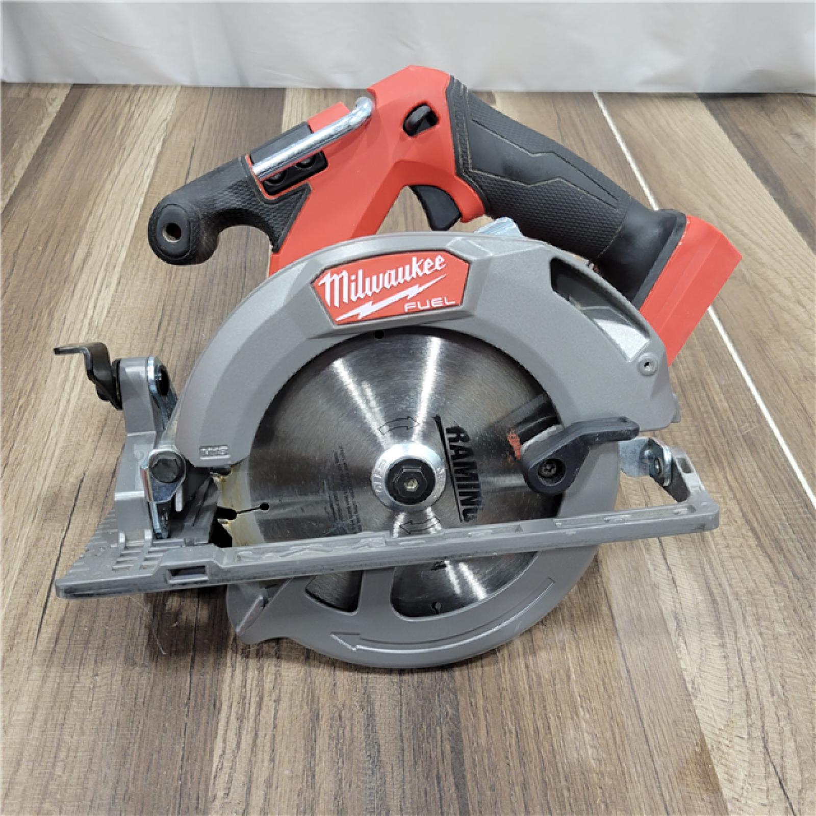 AS-IS Milwaukee M18 FUEL 18V Lithium-Ion Brushless Cordless 6-1/2 in. Circular Saw (Tool-Only)