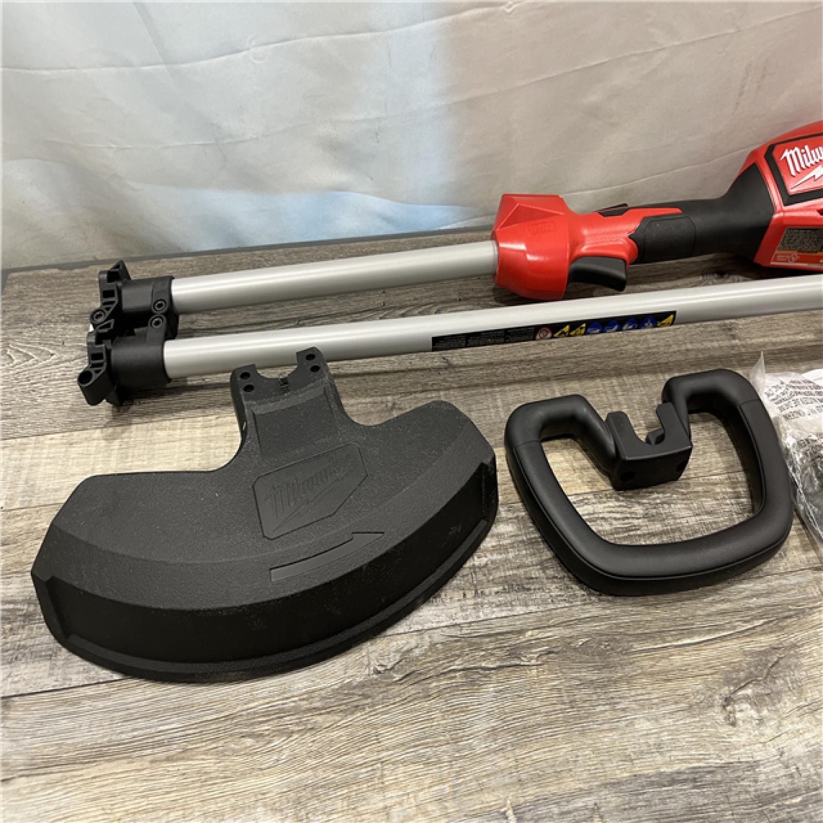 AS-IS Milwaukee Brushless 18V 16in. Cordless Battery Powered String Trimmer (Tool-Only)