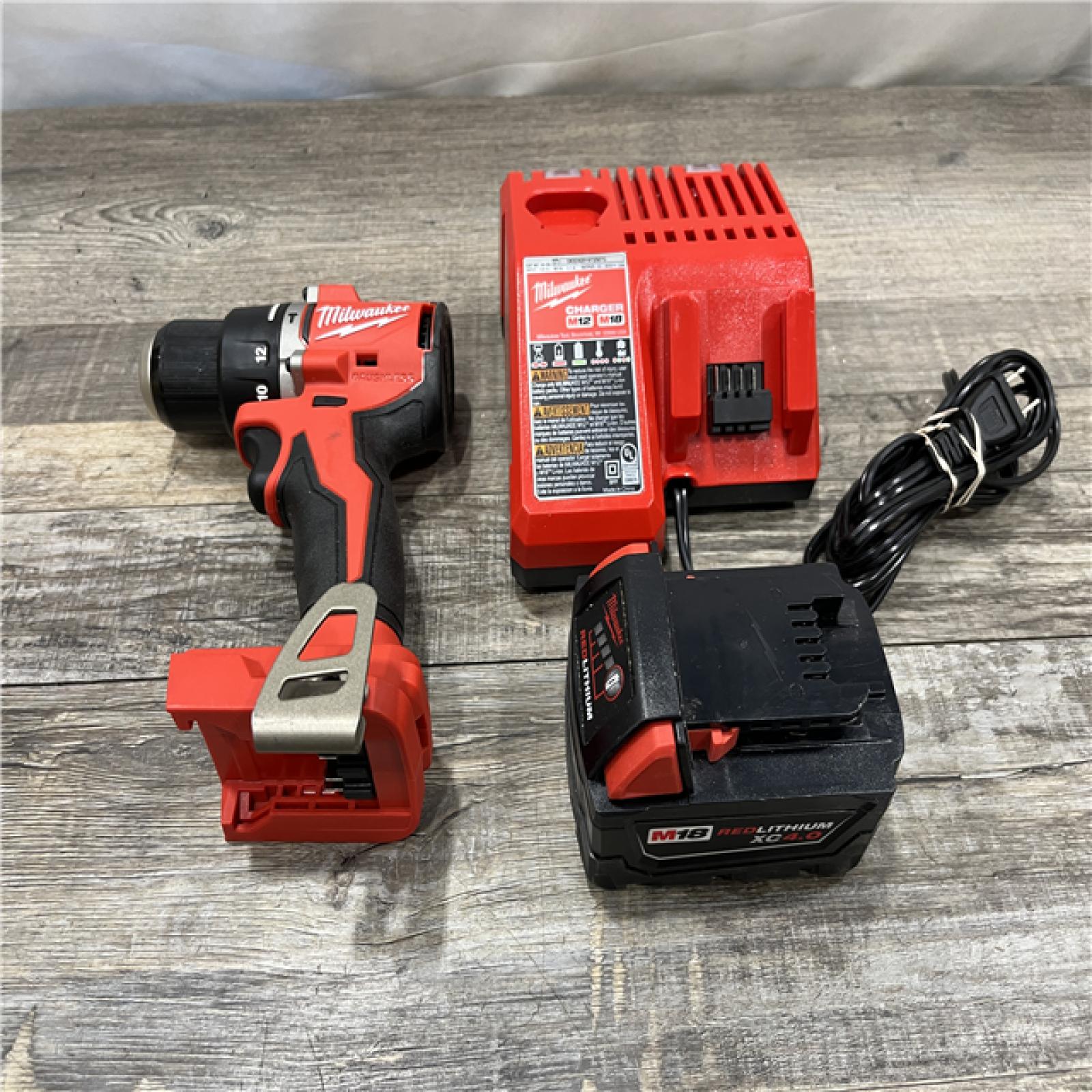 AS-IS Milwaukee 18V Lithium-Ion Brushless Cordless 1/2 in. Compact Hammer Drill/Driver Kit