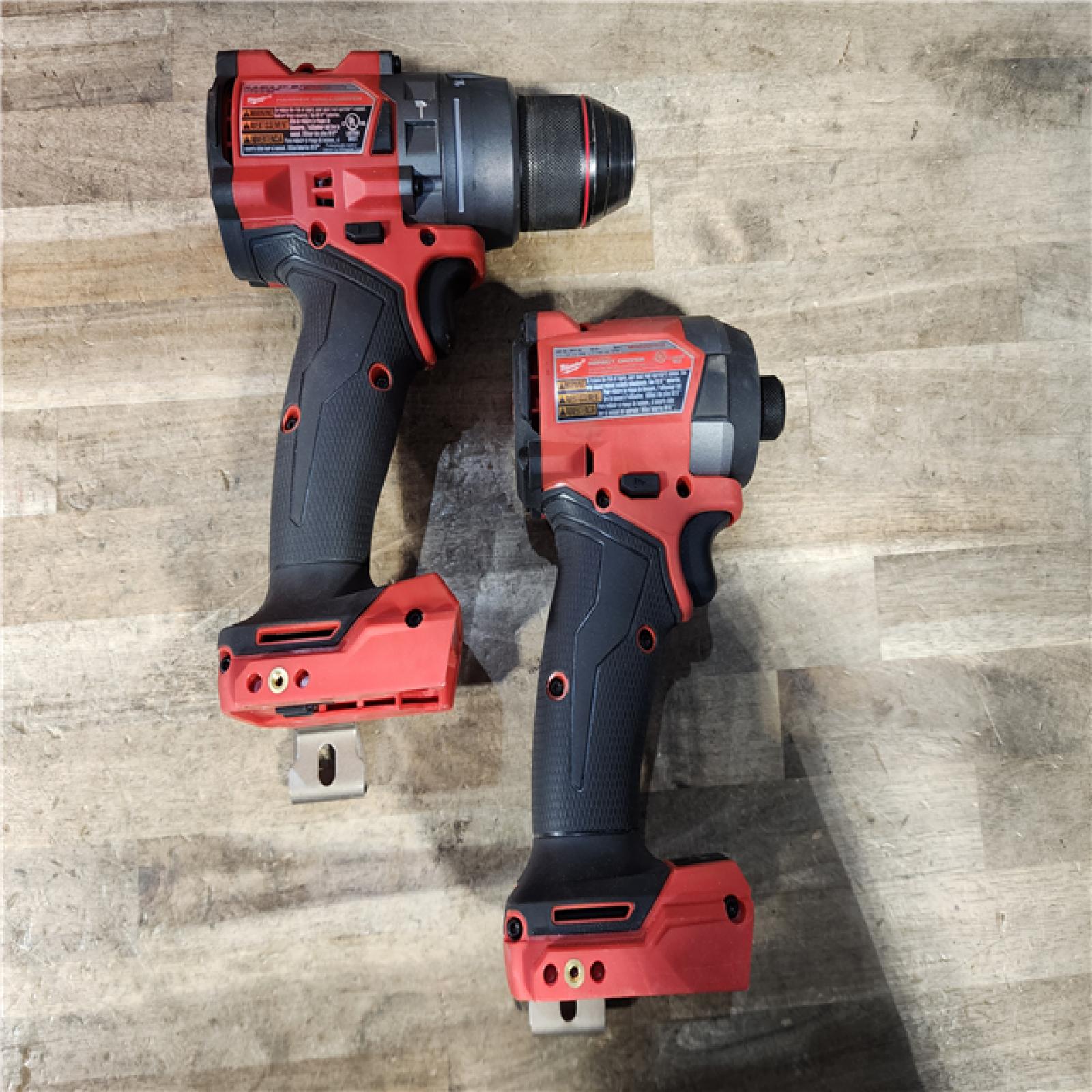 HOUSTON LOCATION - AS-IS Milwaukee FUEL 18V Lithium-Ion Brushless Cordless Hammer Drill and Impact Driver Combo Kit