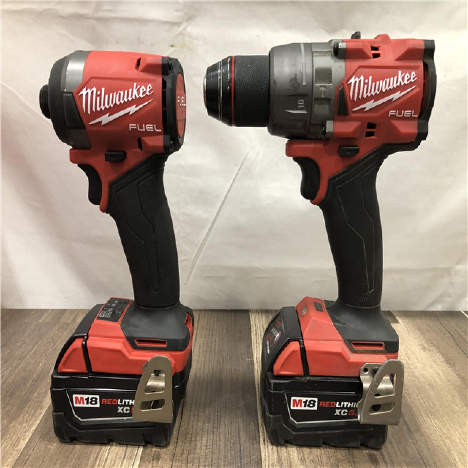 AS-IS Milwaukee FUEL 18V Lithium-Ion Brushless Cordless Hammer Drill and Impact Driver Combo Kit