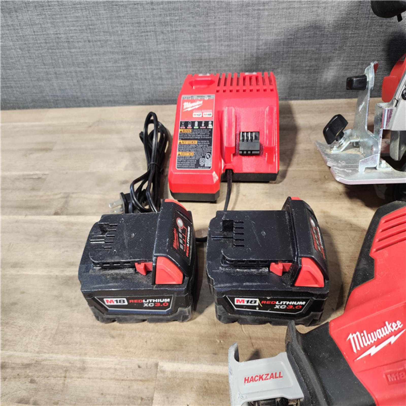 HOUSTON LOCATION - AS-IS Milwaukee M18 18-Volt Lithium-Ion Cordless Combo Kit 7-Tool with 2-Batteries, Charger
