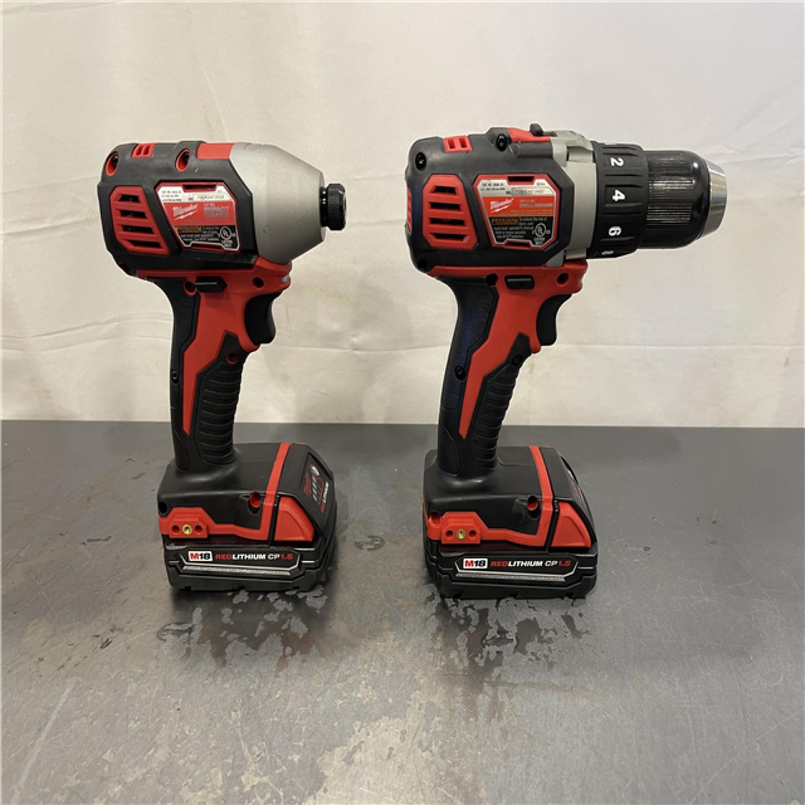 AS-IS - Milwaukee M18 18V Lithium-Ion Cordless Drill Driver/Impact Driver Combo Kit (2-Tool)