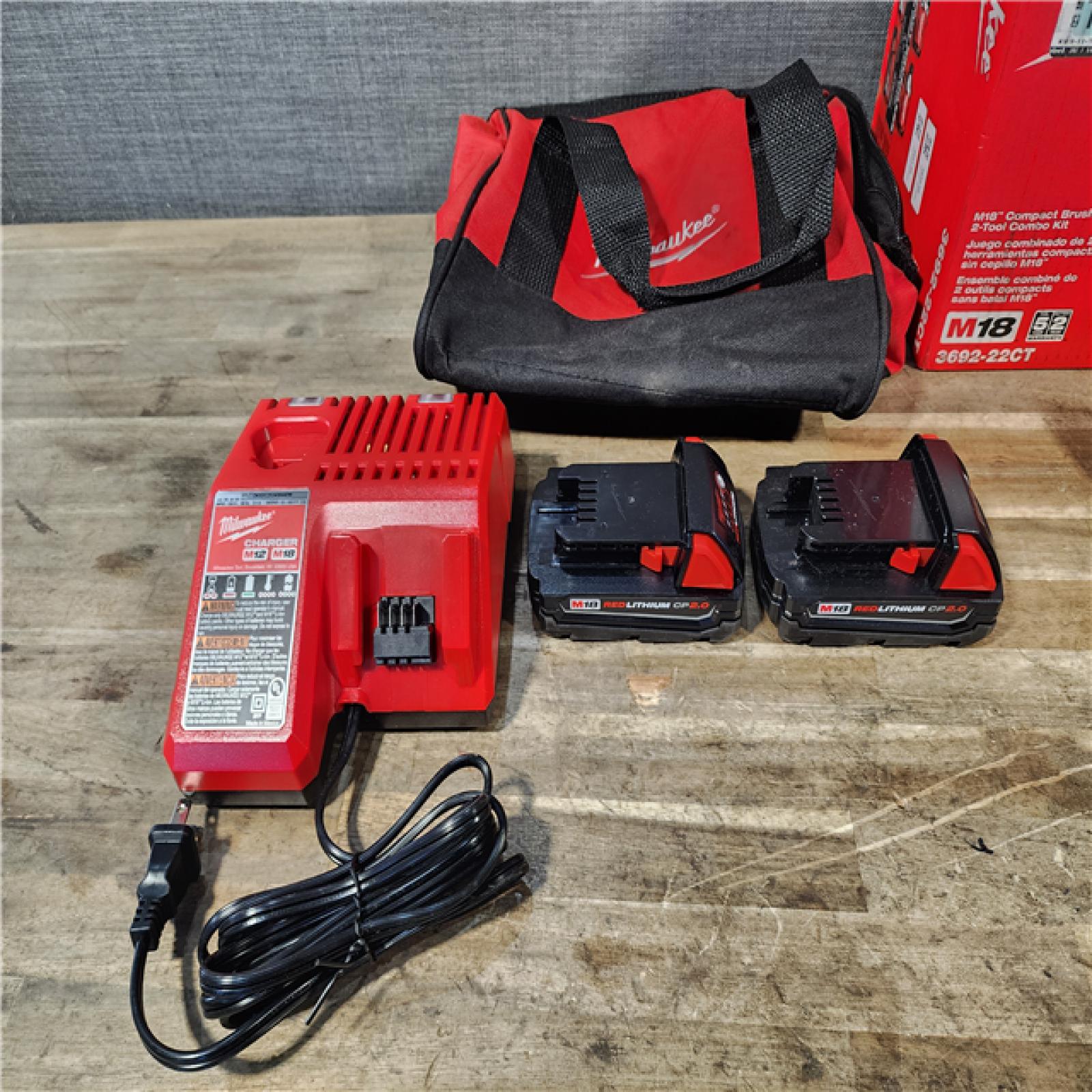 HOUSTON LOCATION - AS-IS Milwaukee M18 18V Lithium-Ion Brushless Cordless Compact Drill/Impact Combo Kit (2-Tool) W/(2) 2.0 Ah Batteries  Charger & Bag