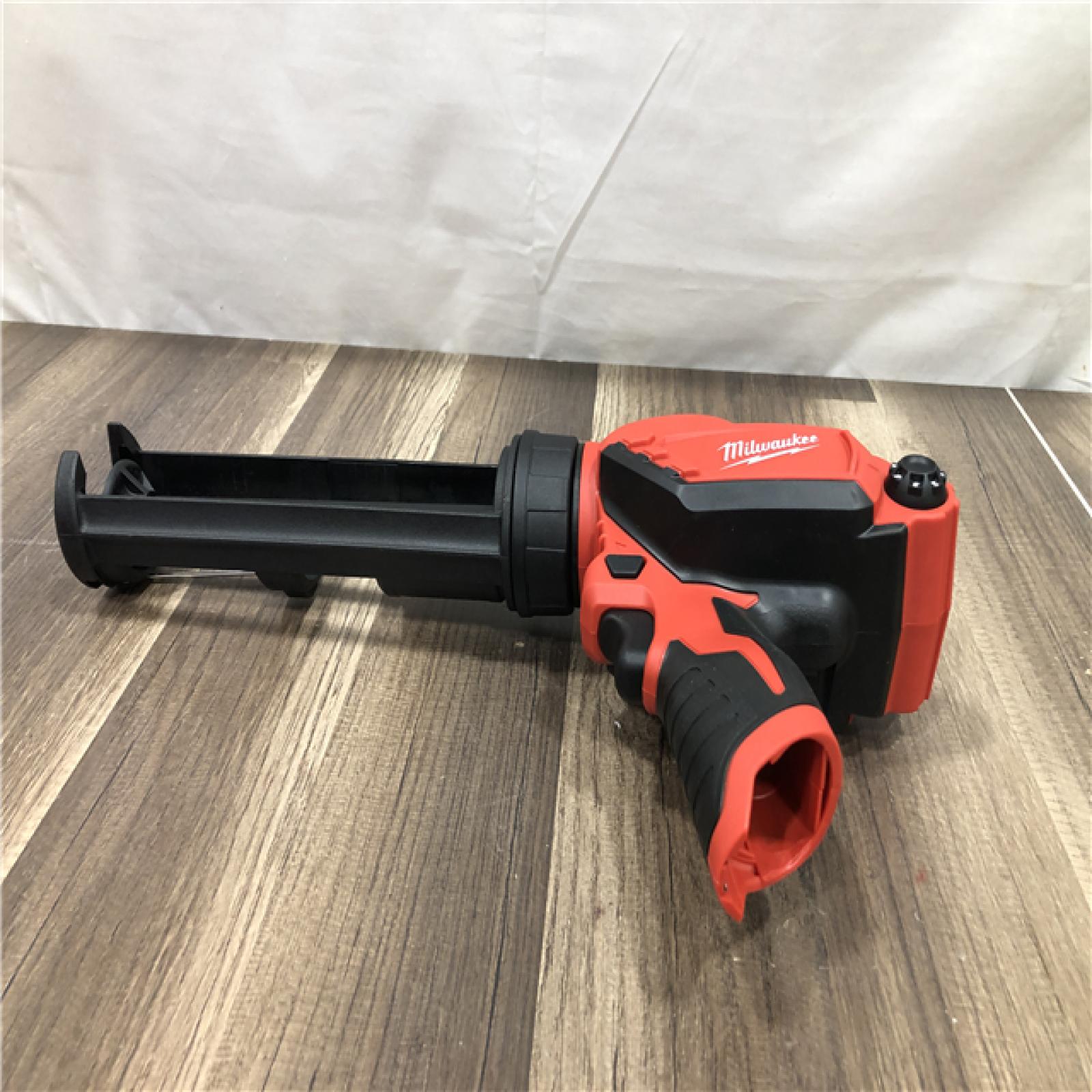 AS-IS Milwaukee 12V Lithium-Ion Cordless 10 oz. Adhesive and Caulk Gun (Tool-Only)