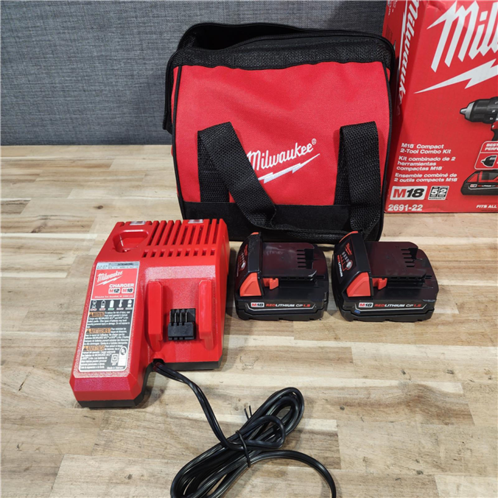 HOUSTON LOCATION - AS-IS Milwaukee 18V Lithium-Ion Cordless Drill Driver/Impact Driver Combo Kit