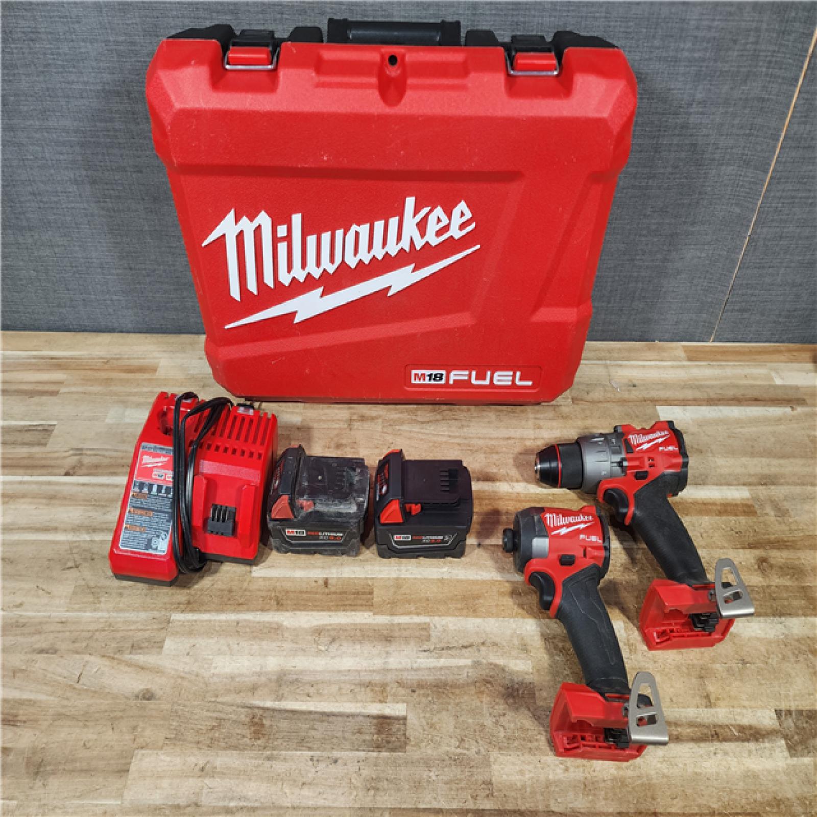 HOUSTON LOCATION - AS - IS Milwaukee FUEL 18V Lithium-Ion Brushless Cordless Hammer Drill and Impact Driver Combo Kit