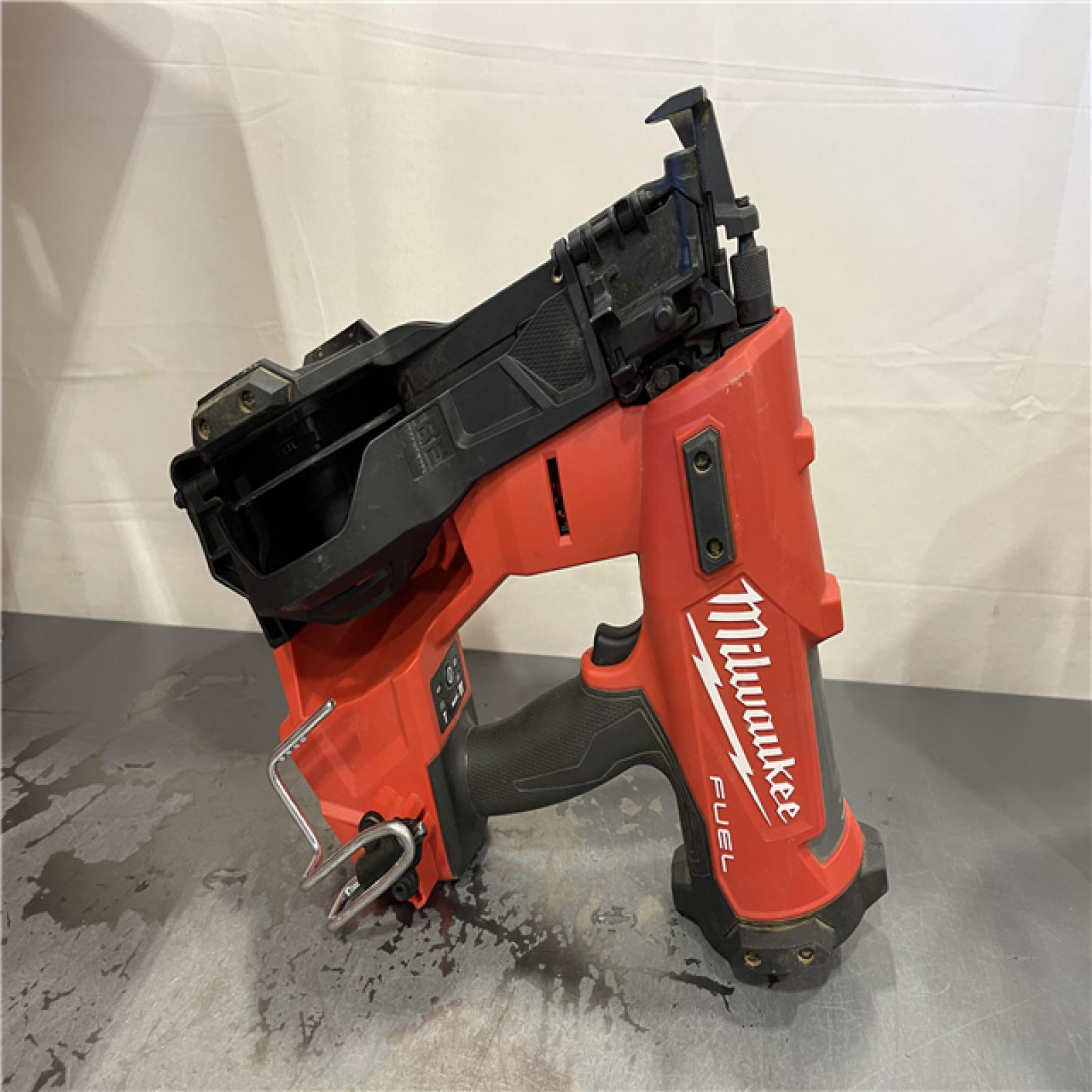 AS-IS - Milwaukee M18 FUEL 18-Volt Lithium-Ion Brushless Cordless Coil Roofing Nailer