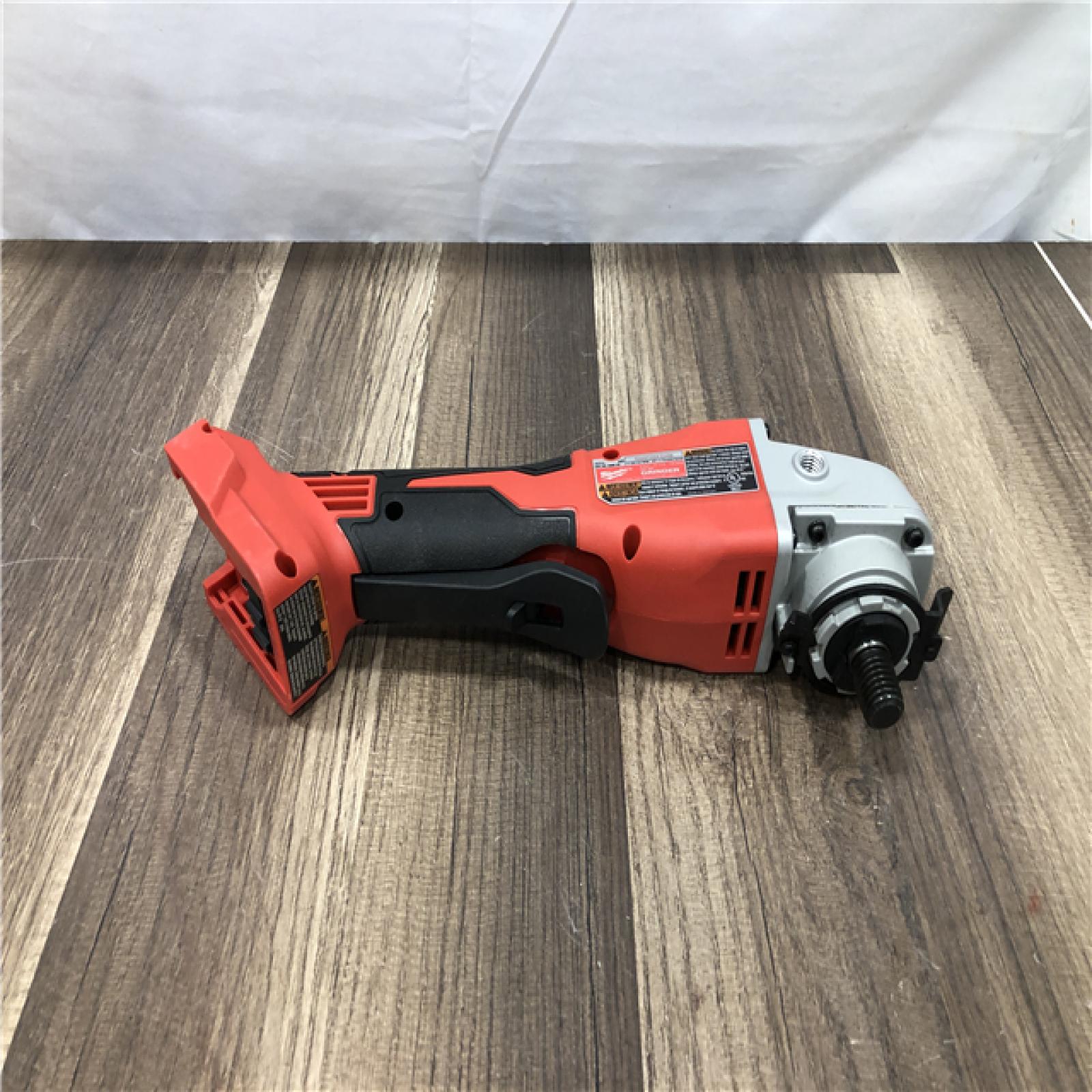 AS-IS Milwaukee 18V Lithium-Ion Brushless Cordless 4-1/2 in./5 in. Grinder w/Paddle Switch (Tool-Only)