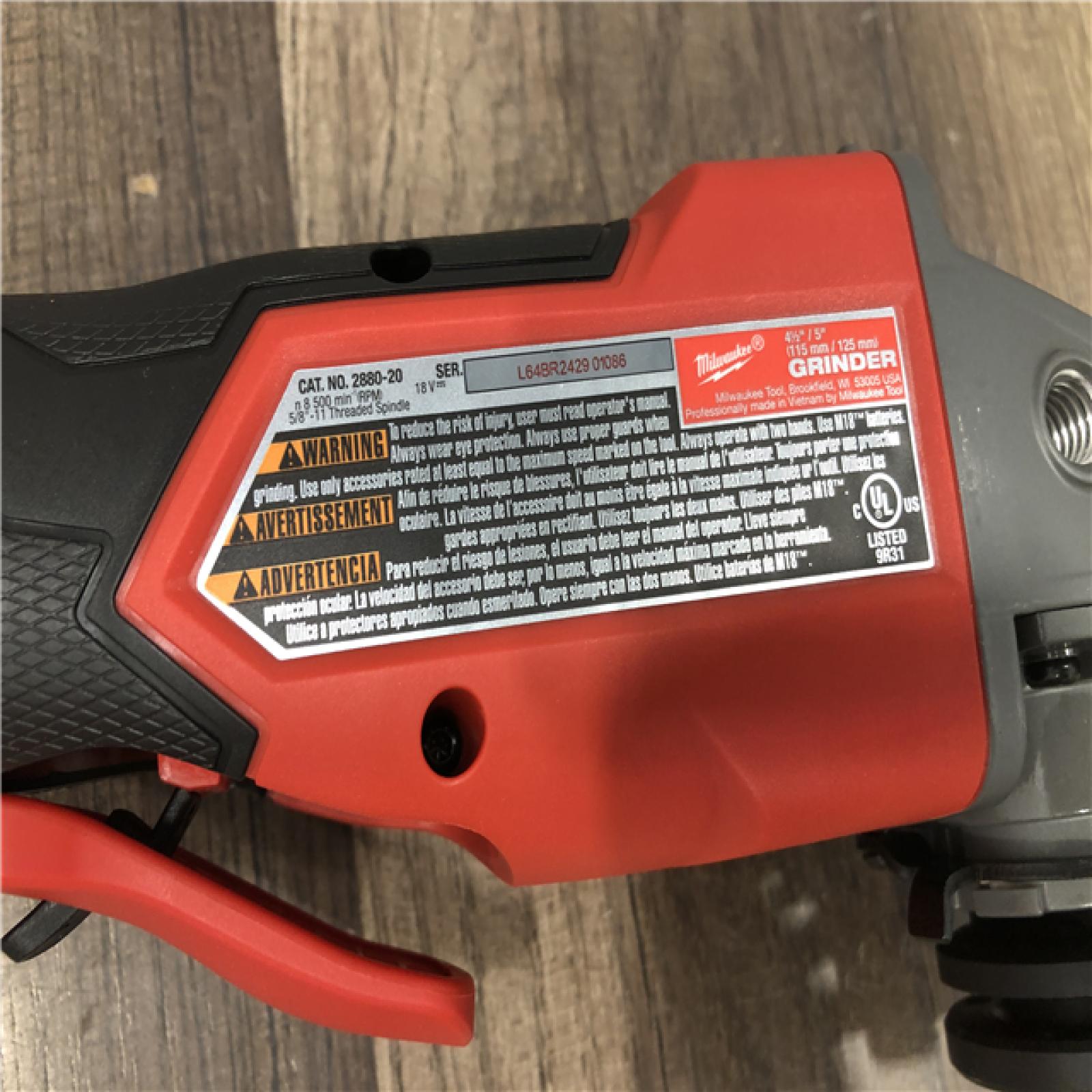 AS-IS Milwaukee FUEL 18V Lithium-Ion Brushless Cordless 4-1/2 in./5 in. Grinder w/Paddle Switch (Tool-Only)