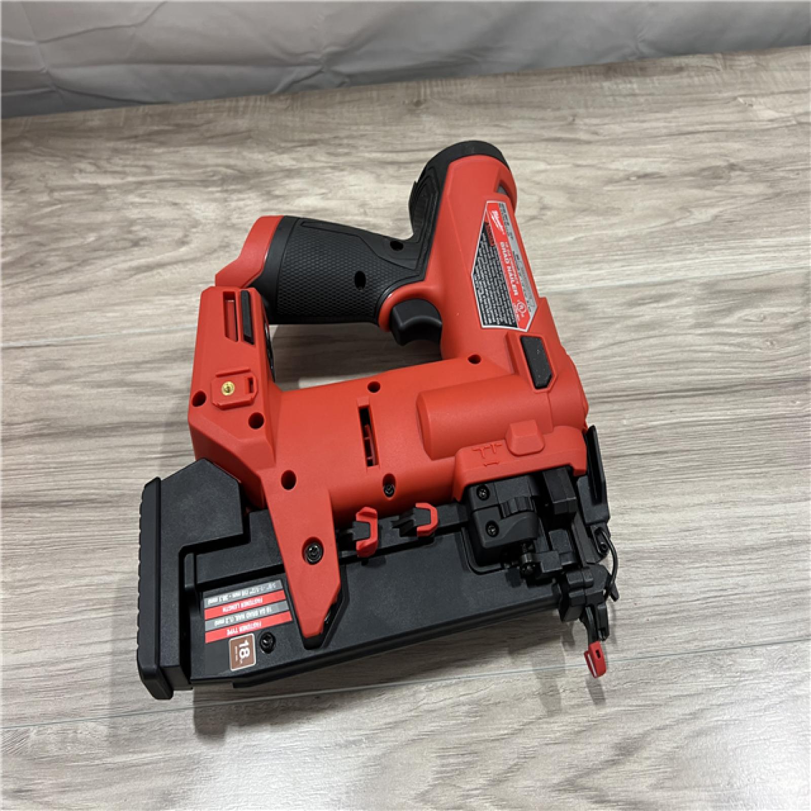 AS-IS Milwaukee  FUEL 12-Volt Lithium-Ion Brushless Cordless 18-Gauge 1-1/2 in. Compact Brad Nailer (Tool Only)