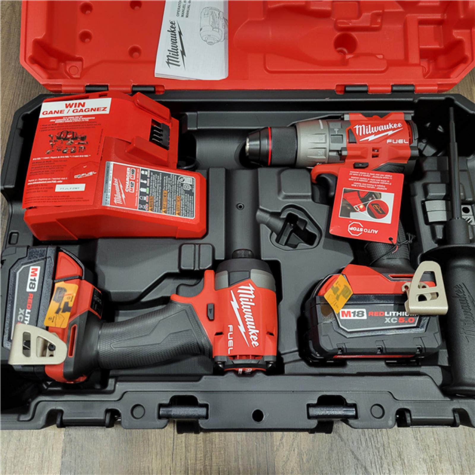 AS-IS Milwaukee M18 FUEL 18V Lithium-Ion Brushless Cordless Hammer Drill and Impact Driver Combo Kit (2-Tool) with 2 Batteries