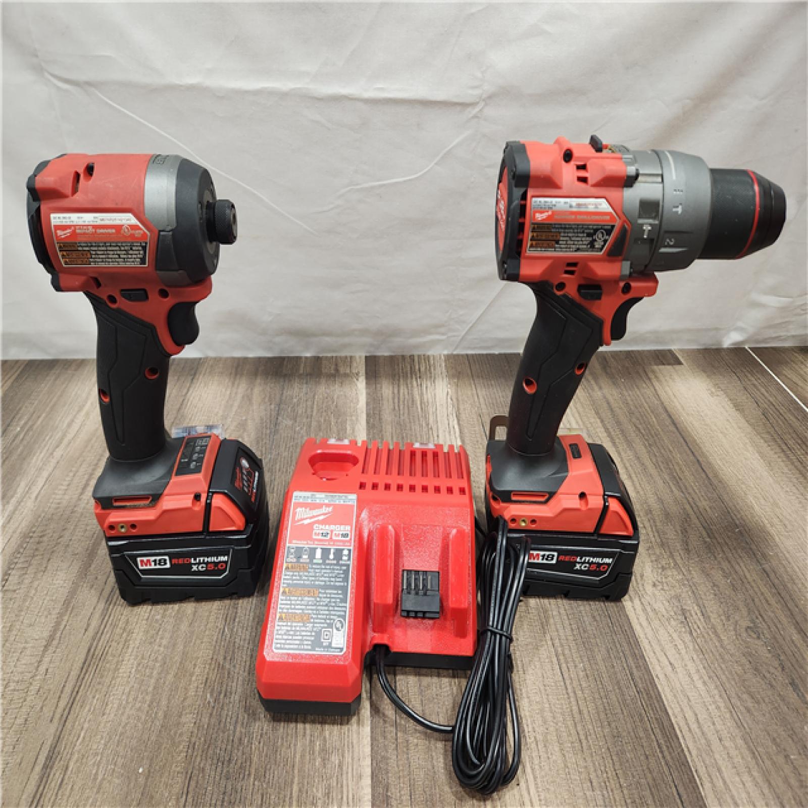 AS-IS- MILWAUKEE FUEL 18V Lithium-Ion Brushless Cordless Hammer Drill and Impact Driver Combo Kit
