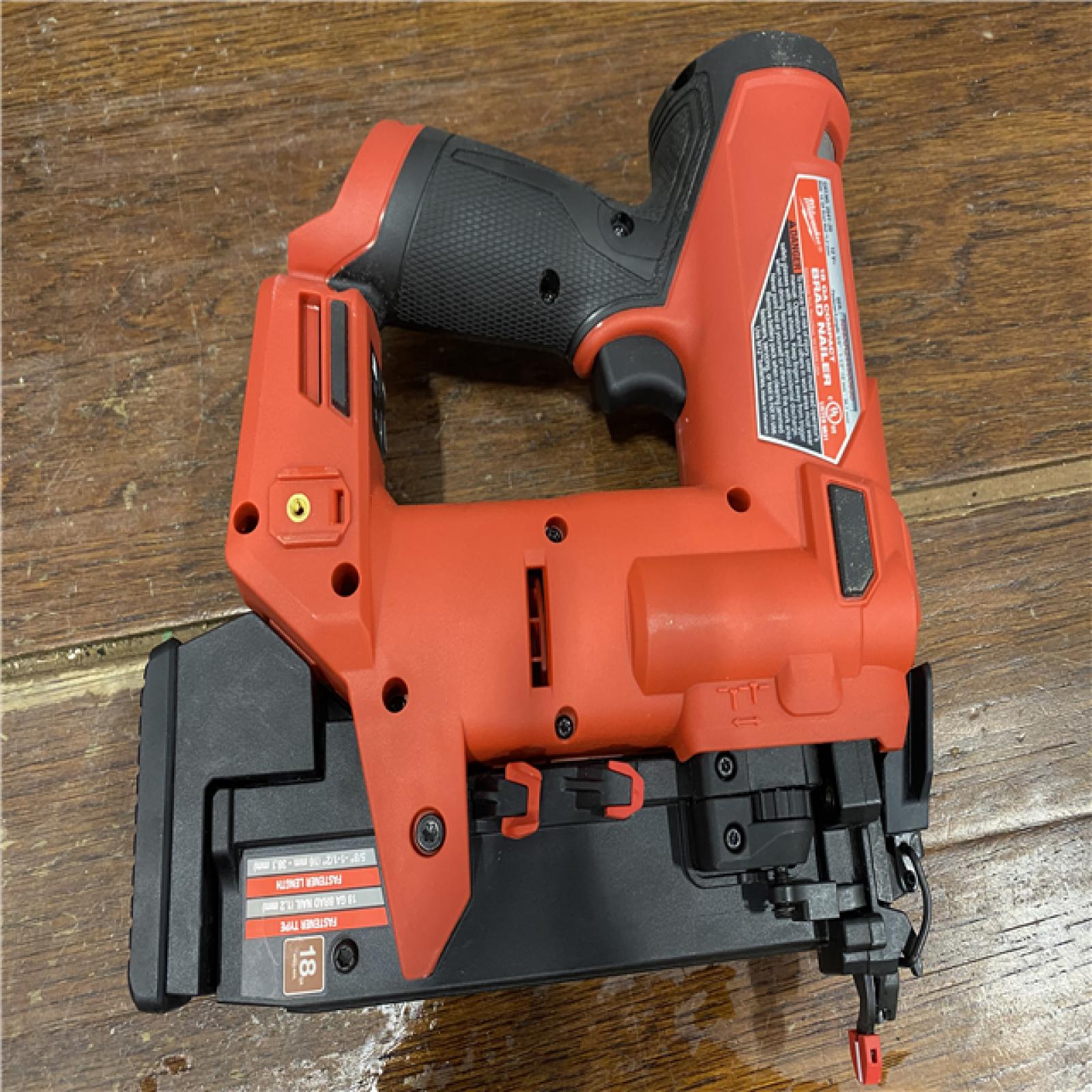 AS-IS M12 FUEL 12-Volt Lithium-Ion Brushless Cordless 18-Guage Compact Brad Nailer (Tool Only)