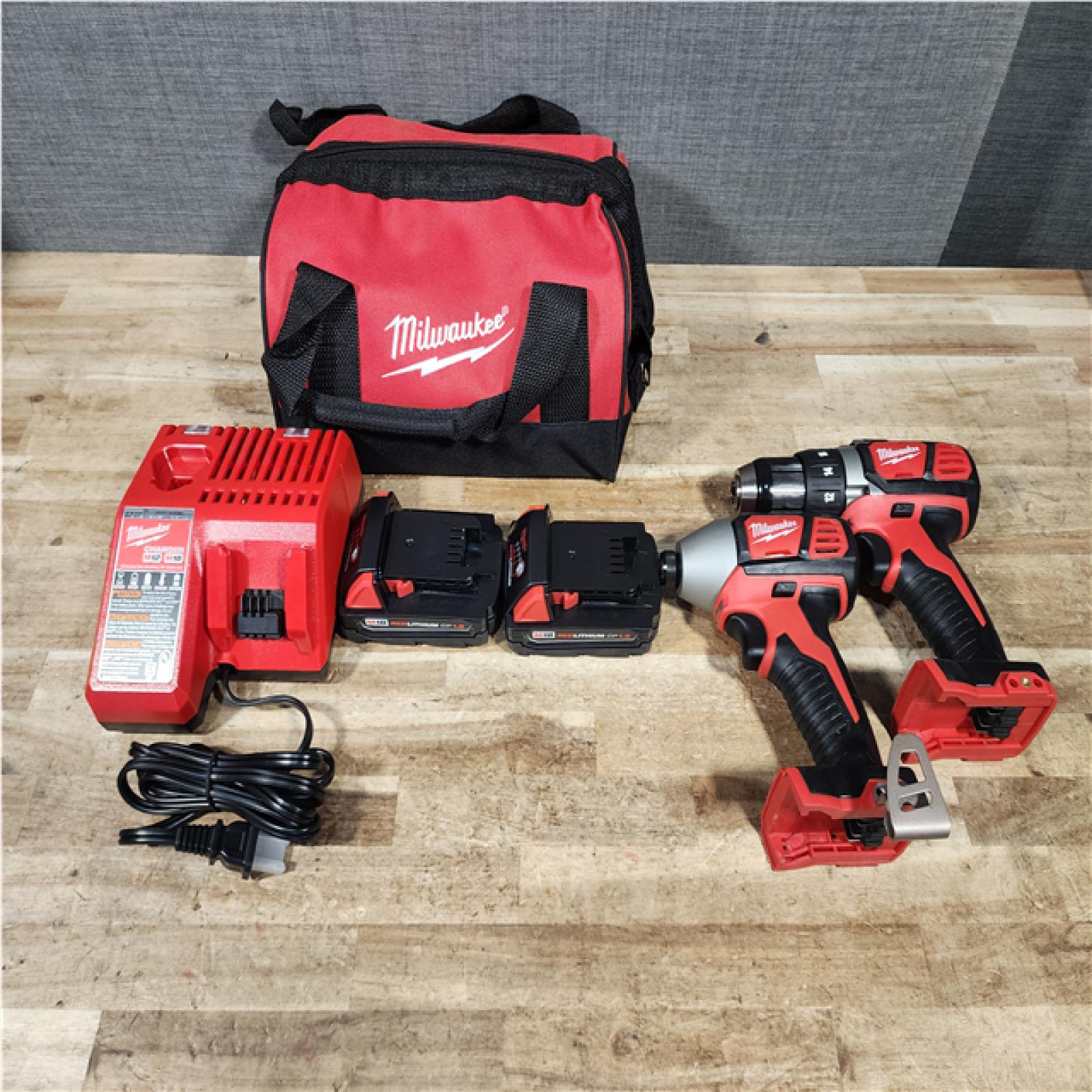 HOUSTON LOCATION - AS - IS Milwaukee 18V Lithium-Ion Cordless Drill Driver/Impact Driver Combo Kit
