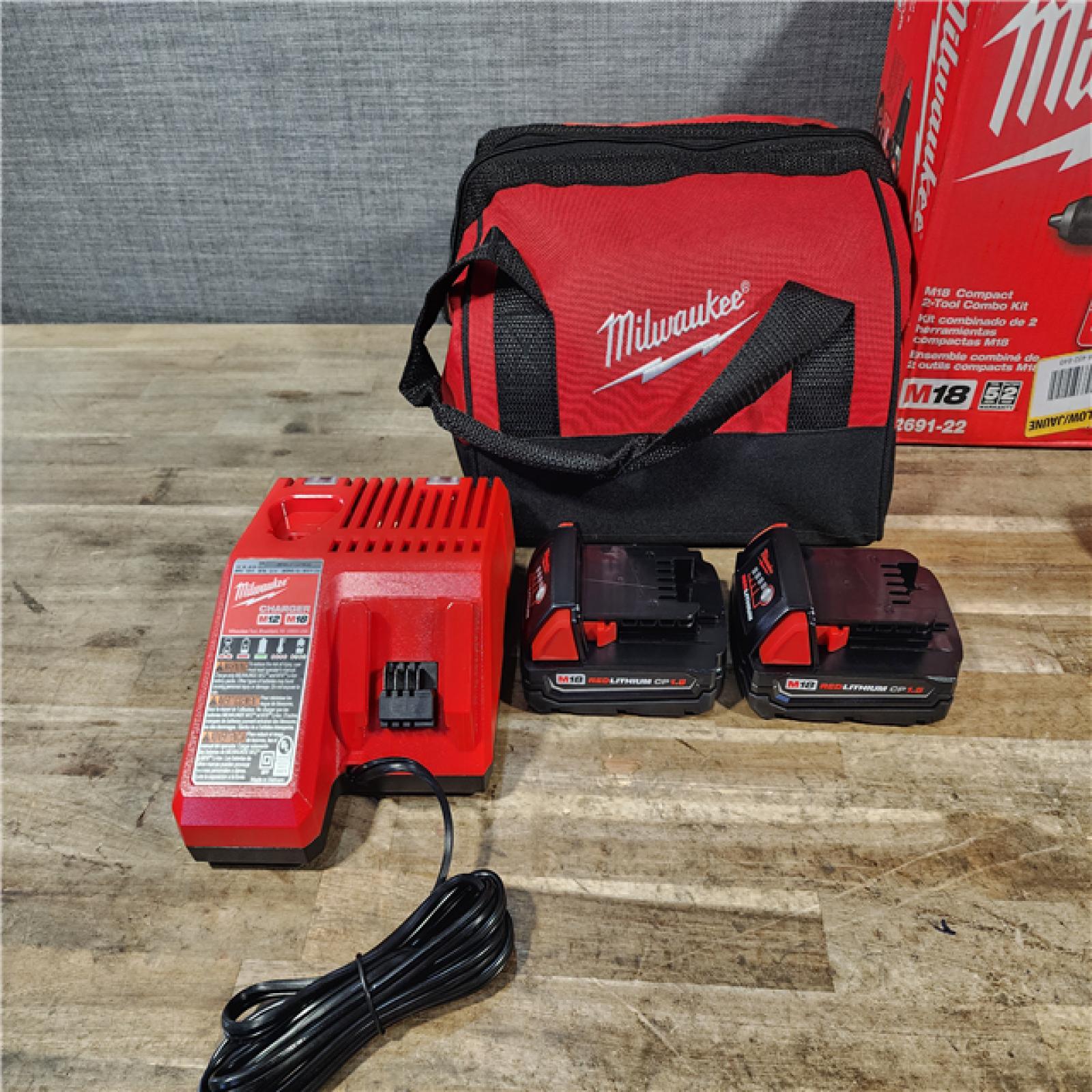 HOUSTON LOCATION - AS-IS Milwaukee 18V Lithium-Ion Cordless Drill Driver/Impact Driver Combo Kit