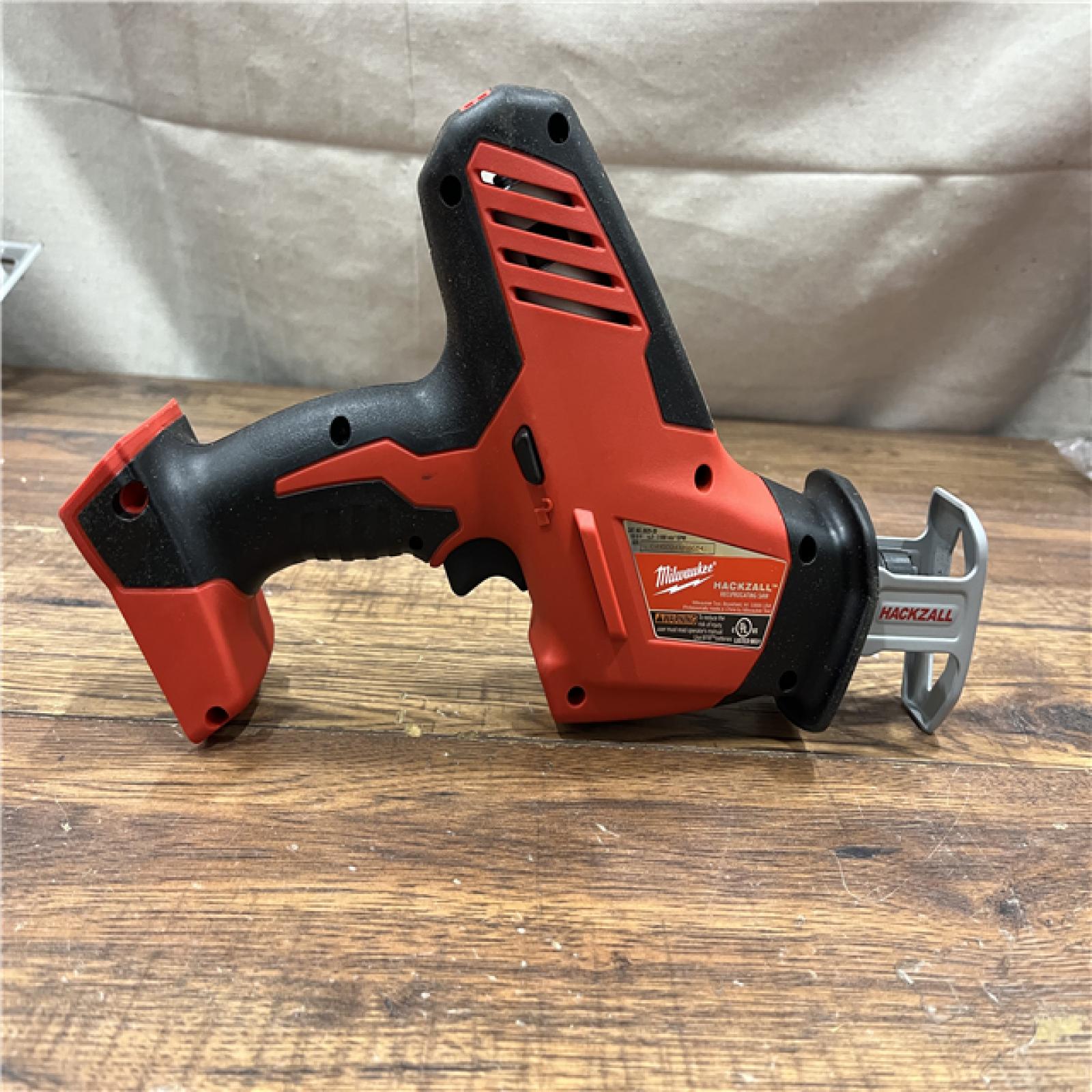 AS-IS Milwaukee M18 18-Volt Lithium-Ion Brushless Cordless Combo Kit (4-Tool) with 2-Batteries, 1-Charger and Tool Bag