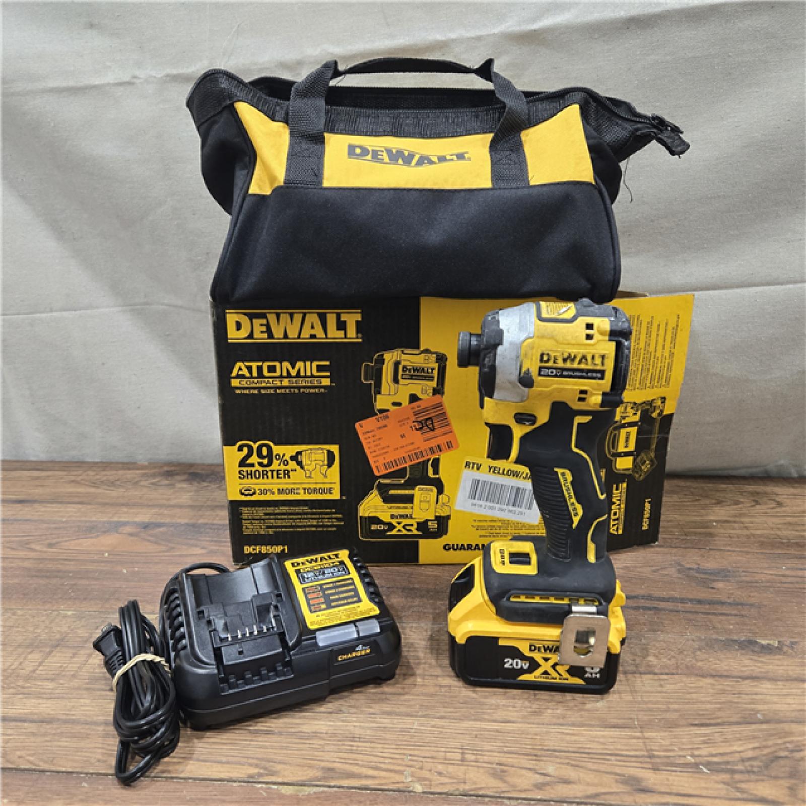 AS-IS DEWALT ATOMIC 20V MAX Lithium-Ion Cordless 1/4 in. Brushless Impact Driver Kit, 5 Ah Battery, Charger, and Bag