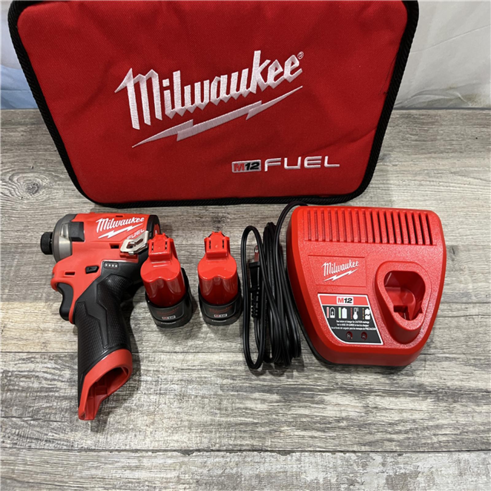 AS-IS Milwaukee FUEL SURGE 12V Lithium-Ion Brushless Cordless 1/4 in. Hex Impact Driver Compact Kit