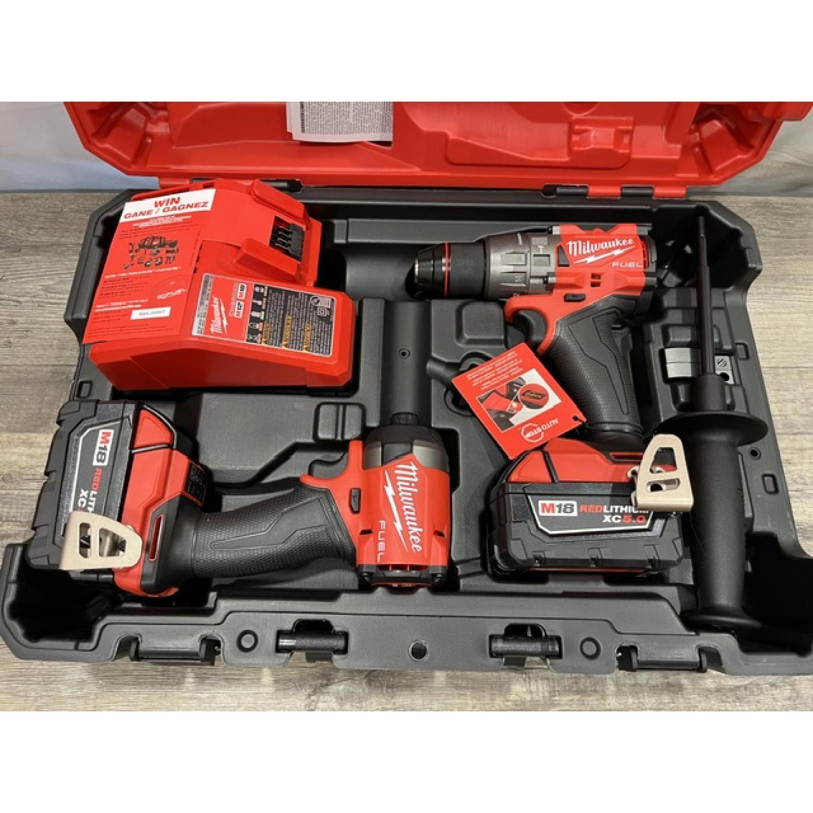 NEW - Milwaukee FUEL 18V Lithium-Ion Brushless Cordless Hammer Drill and Impact Driver Combo Kit
