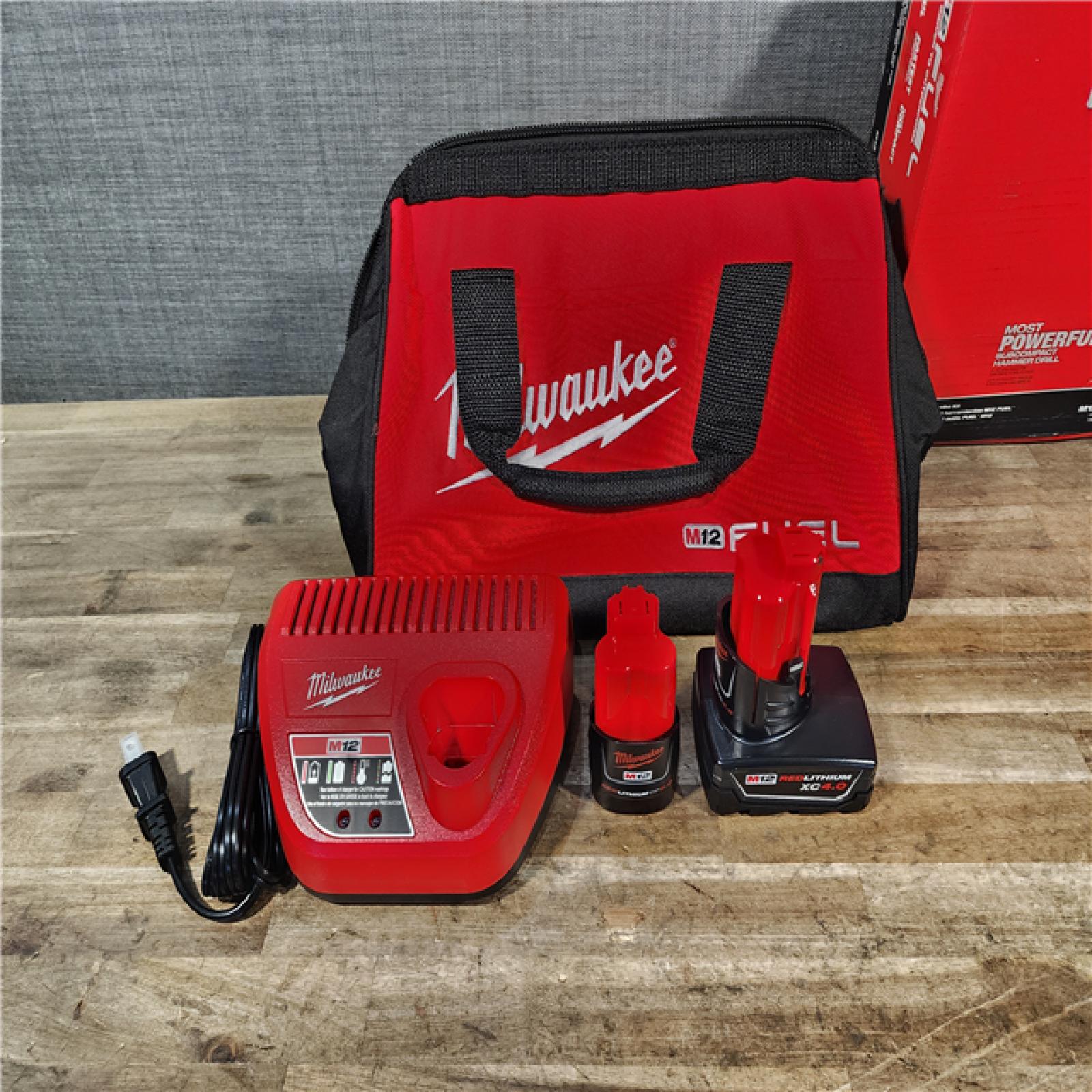 HOUSTON LOCATION - AS-IS Milwaukee FUEL 12-Volt Lithium-Ion Brushless Cordless Hammer Drill and Impact Driver Combo Kit