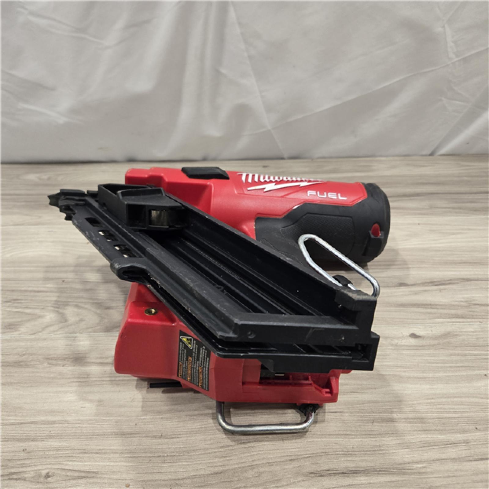 AS-IS Milwaukee 2744-20 M18 FUEL 3-1/2 in. 18V 21-Degree Cordless Framing Nailer (Tool-Only)