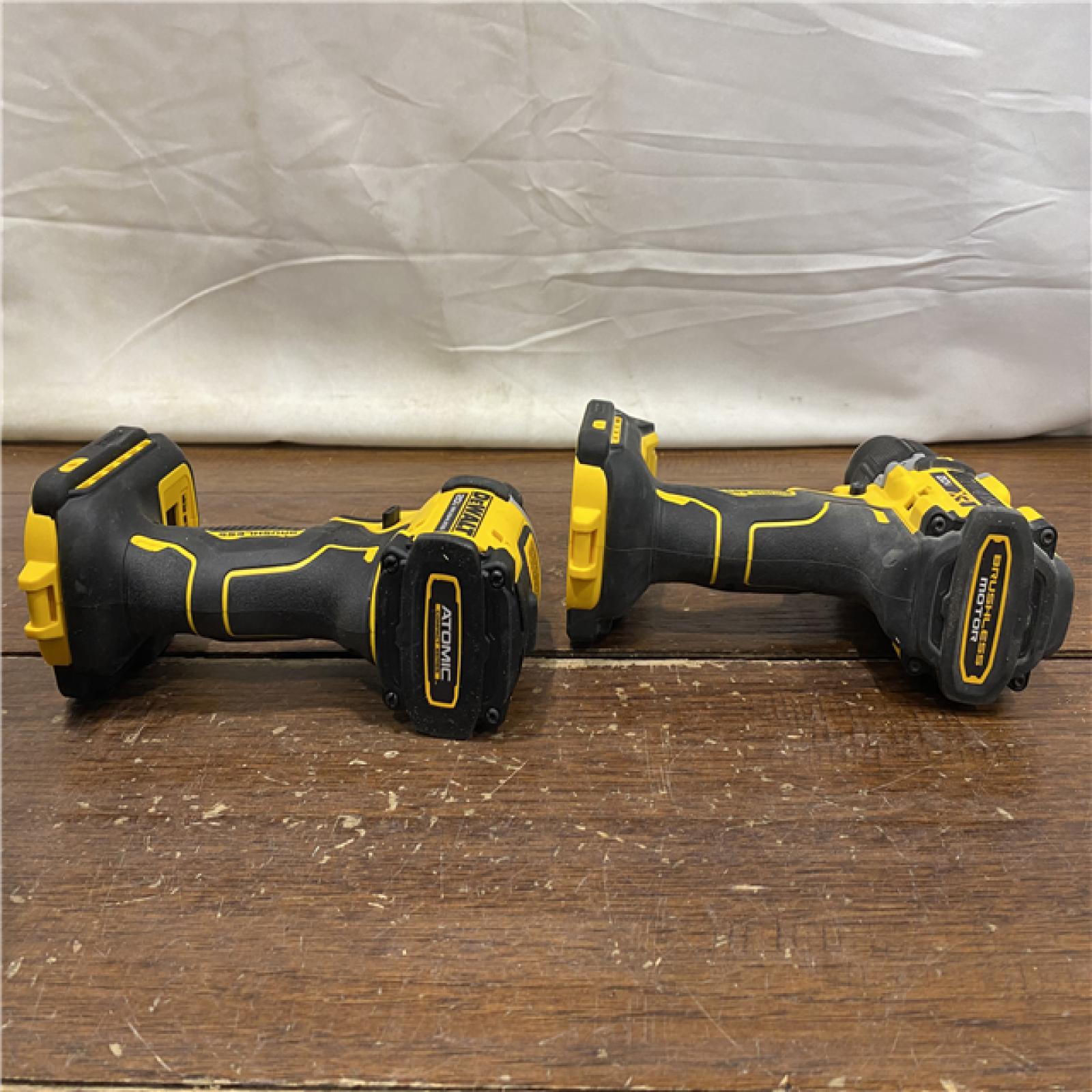 AS-IS DEWALT 20V MAX XR Hammer Drill and ATOMIC Impact Driver 2 Tool Cordless Combo Kit with (2) 4.0Ah Batteries, Charger, and Bag