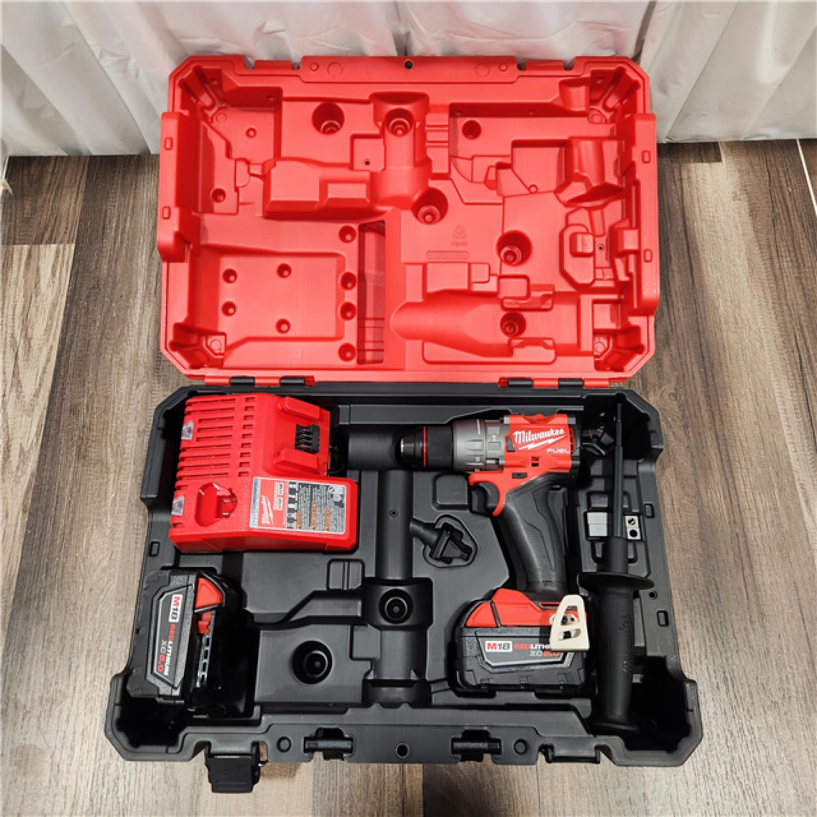 AS IS MIKWAUKEE M18 FUEL 18V Lithium-Ion Brushless Cordless Hammer Drill and Impact Driver Combo Kit (2-Tool) with 2 Batteries