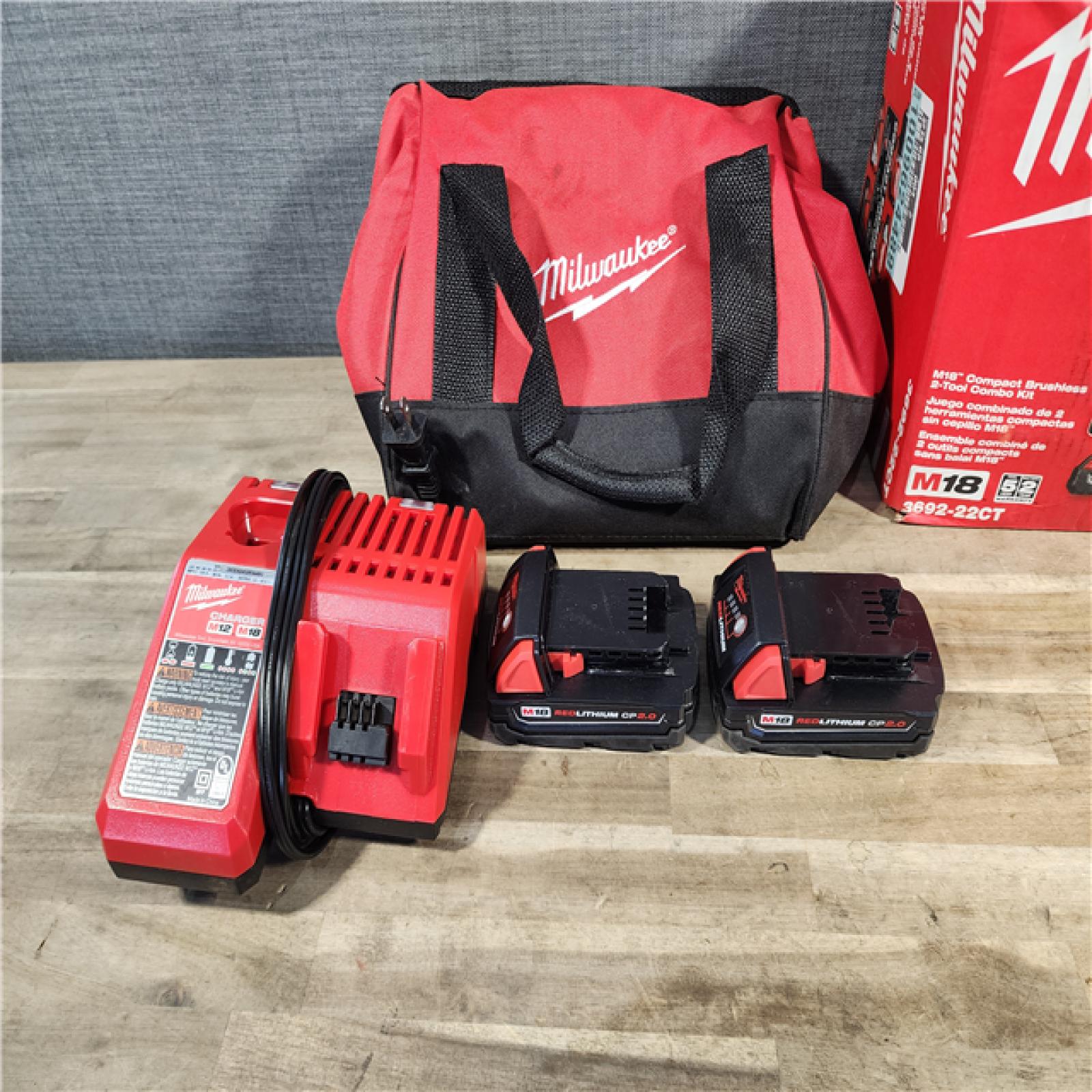 HOUSTON LOCATION - AS-IS Milwaukee M18 18V Lithium-Ion Brushless Cordless Compact Drill/Impact Combo Kit (2-Tool) W/(2) 2.0 Ah Batteries, Charger & Bag