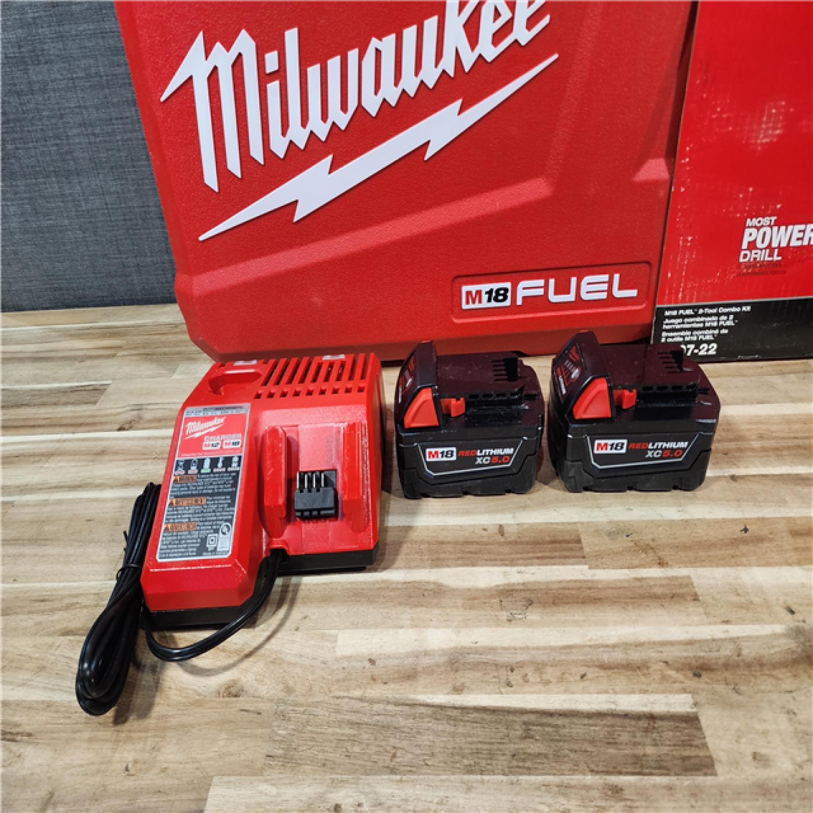HOUSTON LOCATION - AS-IS Milwaukee  FUEL 18V Lithium-Ion Brushless Cordless Hammer Drill and Impact Driver Combo Kit