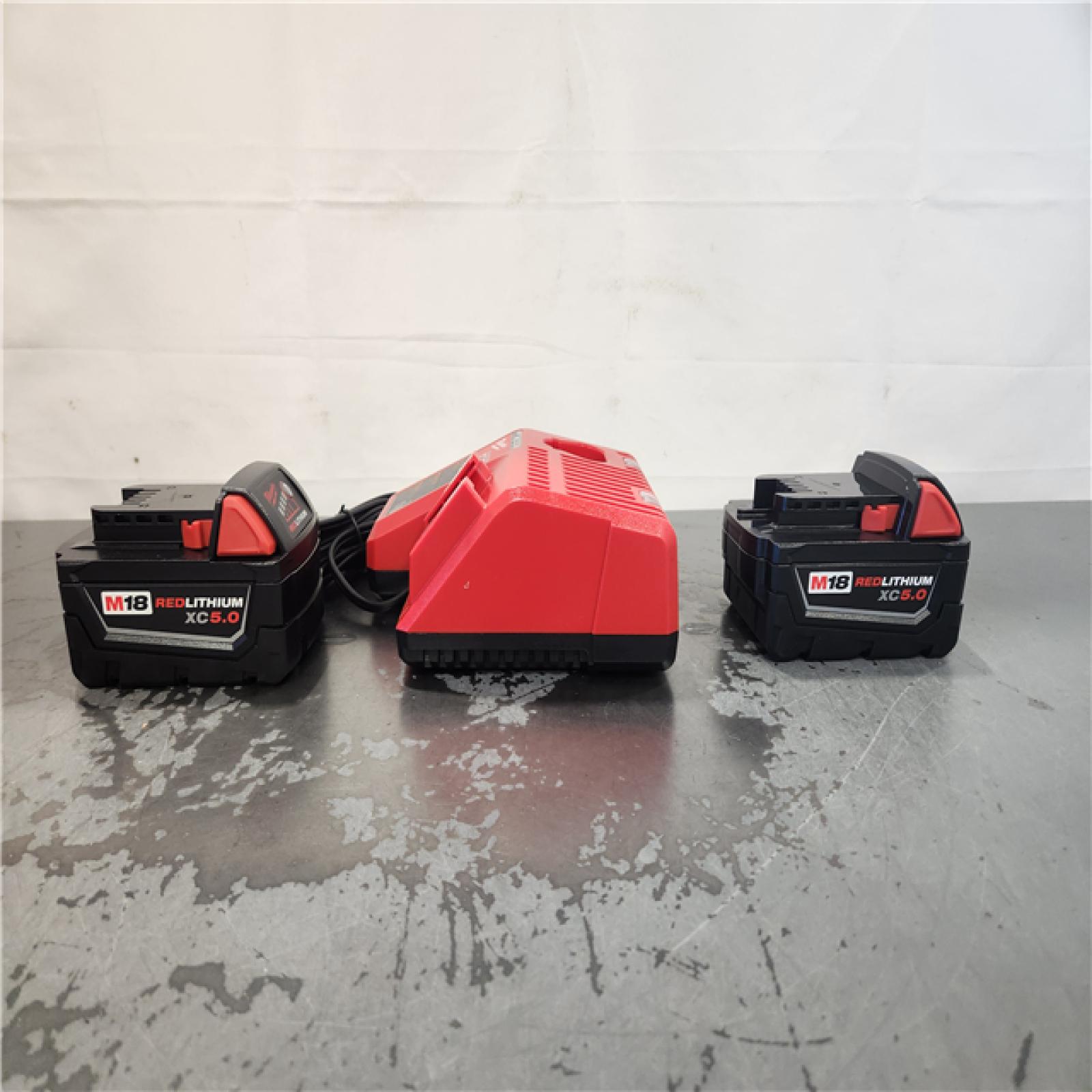 AS-IS- Milwaukee M18 18-Volt Lithium-Ion XC Starter Kit with Two 5.0Ah Batteries and Charger