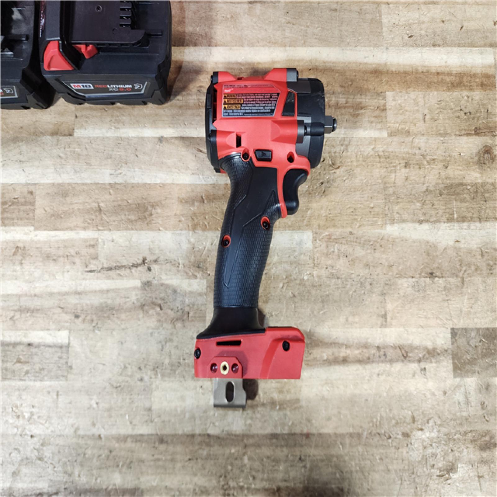HOUSTON LOCATION - AS - IS Milwaukee FUEL 18V Lithium-Ion Brushless Cordless 3/8 in. Compact Impact Wrench Kit