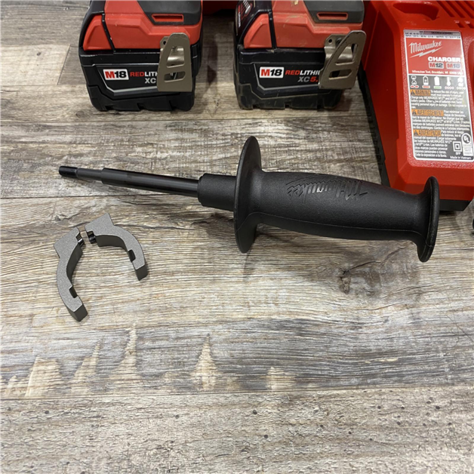 AS-IS Milwaukee FUEL 18V Lithium-Ion Brushless Cordless Hammer Drill and Impact Driver Combo Kit