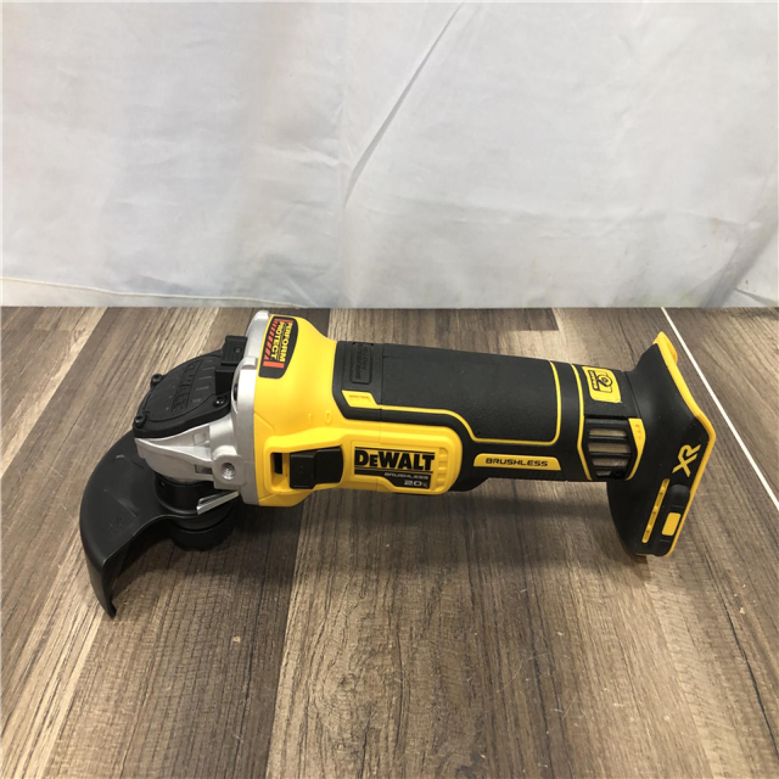 AS-IS DEWALT 20V MAX XR Cordless Brushless 4.5 in. Slide Switch Small Angle Grinder with Kickback Brake (Tool Only)
