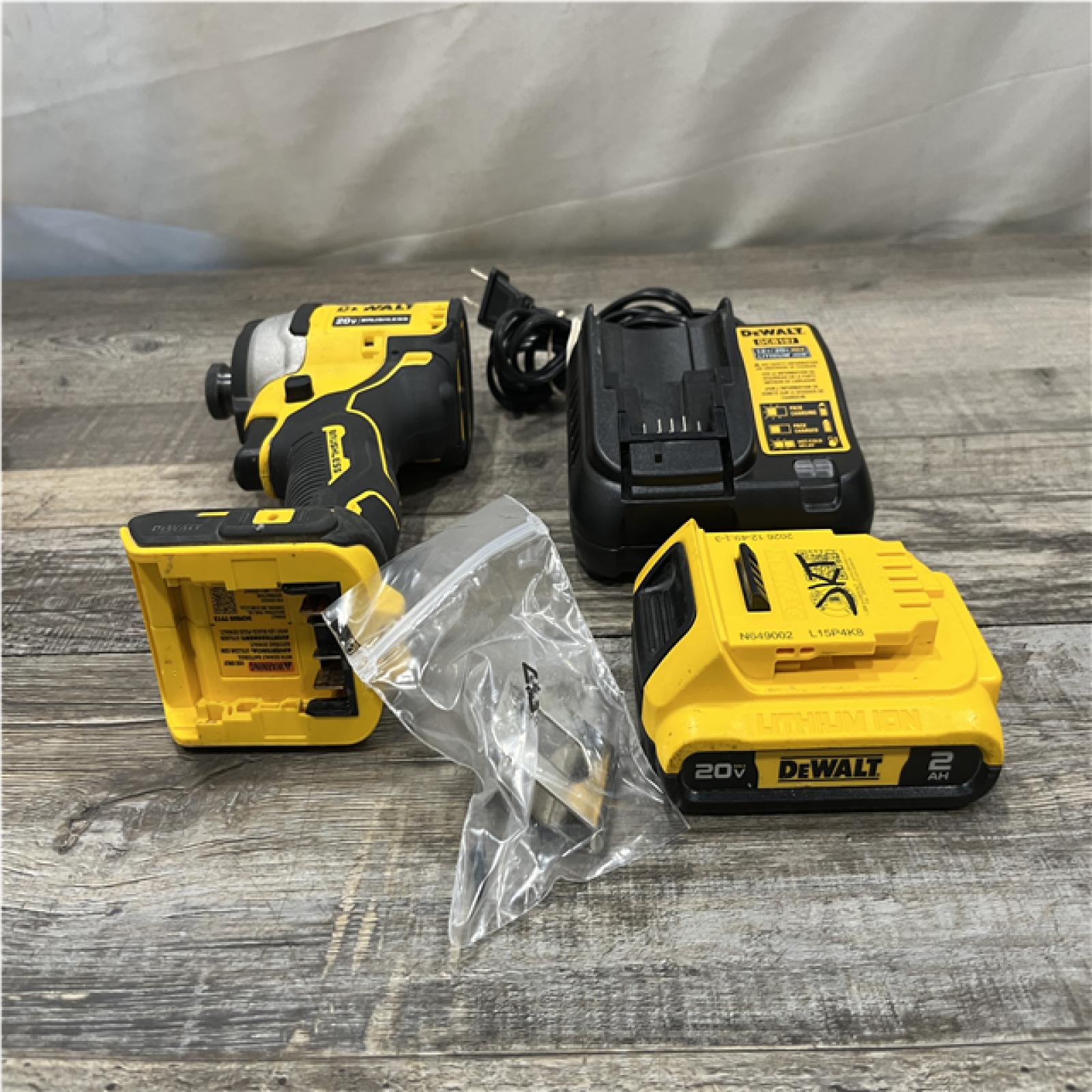 AS-IS DEWALT Atomic 20V Max Lithium-Ion Brushless Cordless Compact 1/4 in. Impact Driver Kit