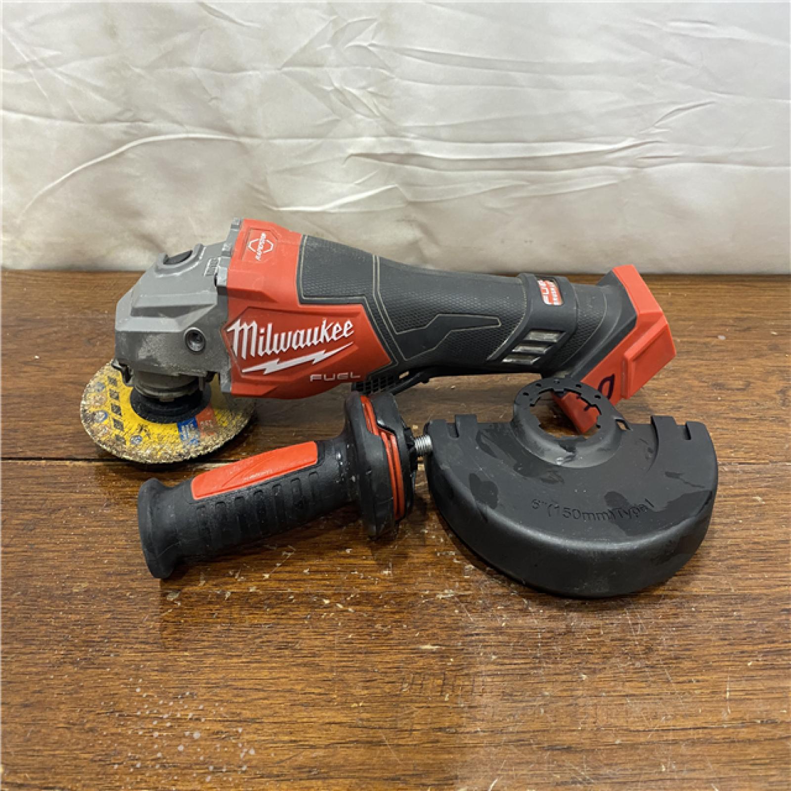 AS-IS Milwaukee M18 FUEL 4-1/2-6 Braking Grinder, Paddle Switch