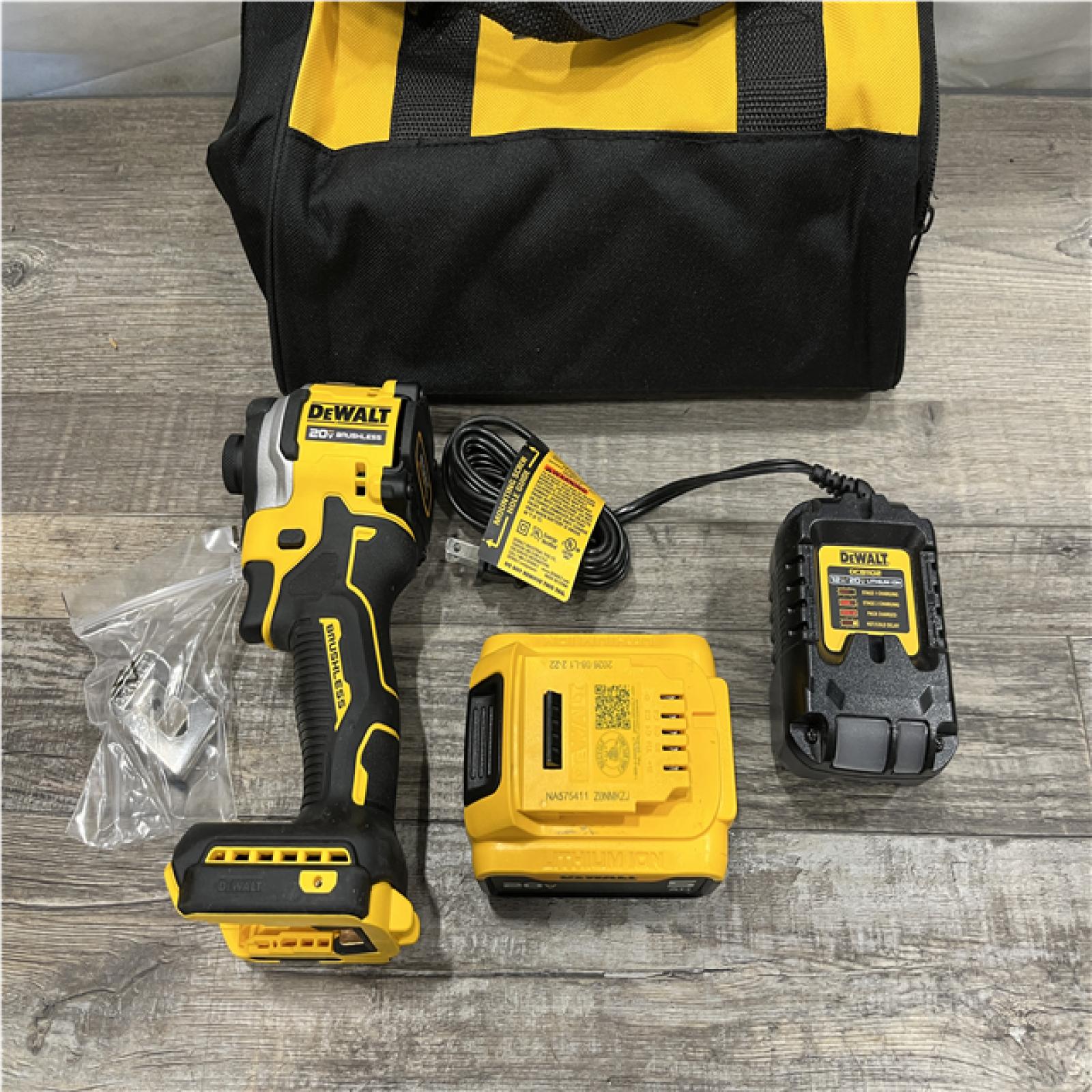 AS-IS DEWALT ATOMIC 20V MAX Lithium-Ion Cordless 1/4 in. Brushless Impact Driver Kit