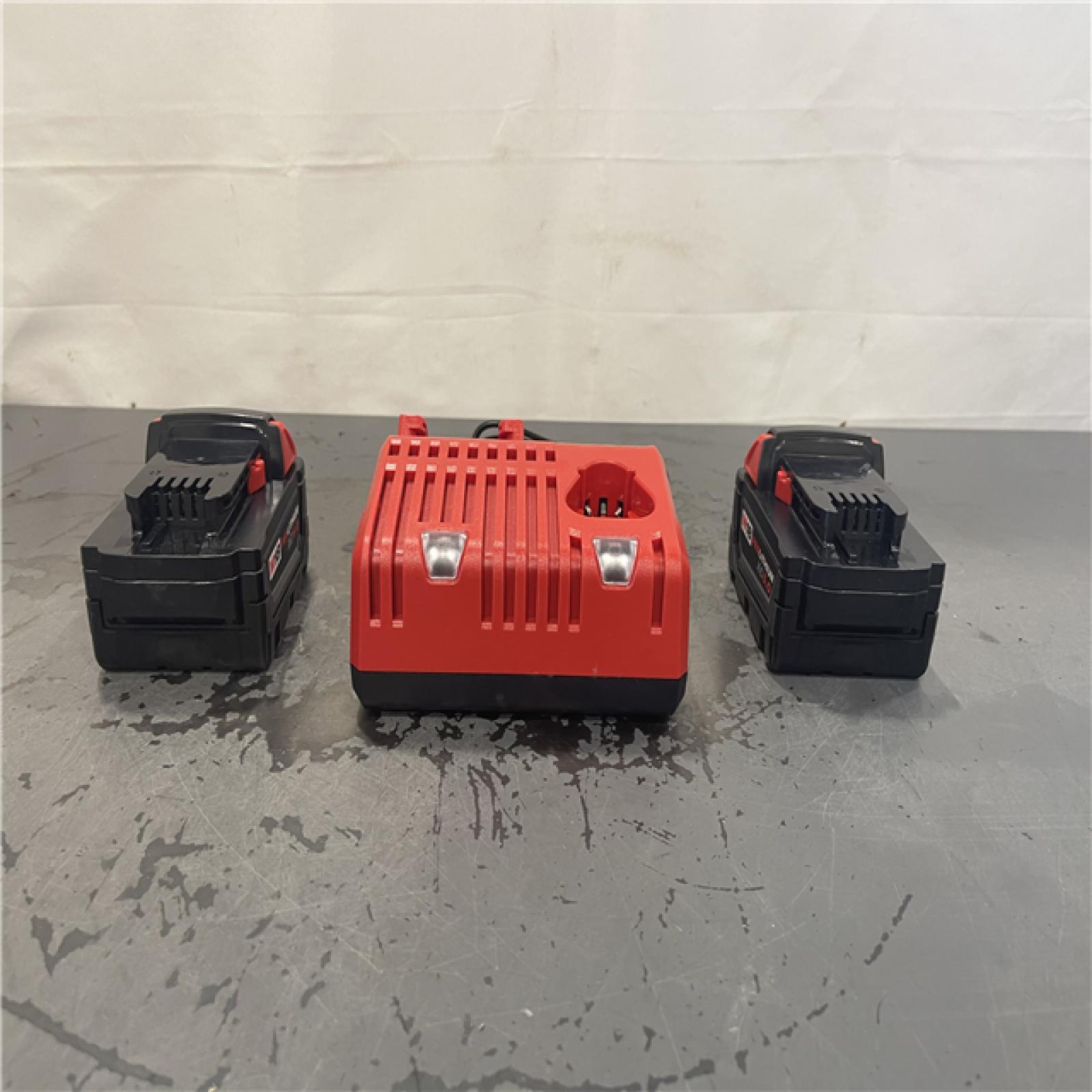 AS-IS- Milwaukee M18 18-Volt Lithium-Ion XC Starter Kit with Two 5.0Ah Batteries and Charger