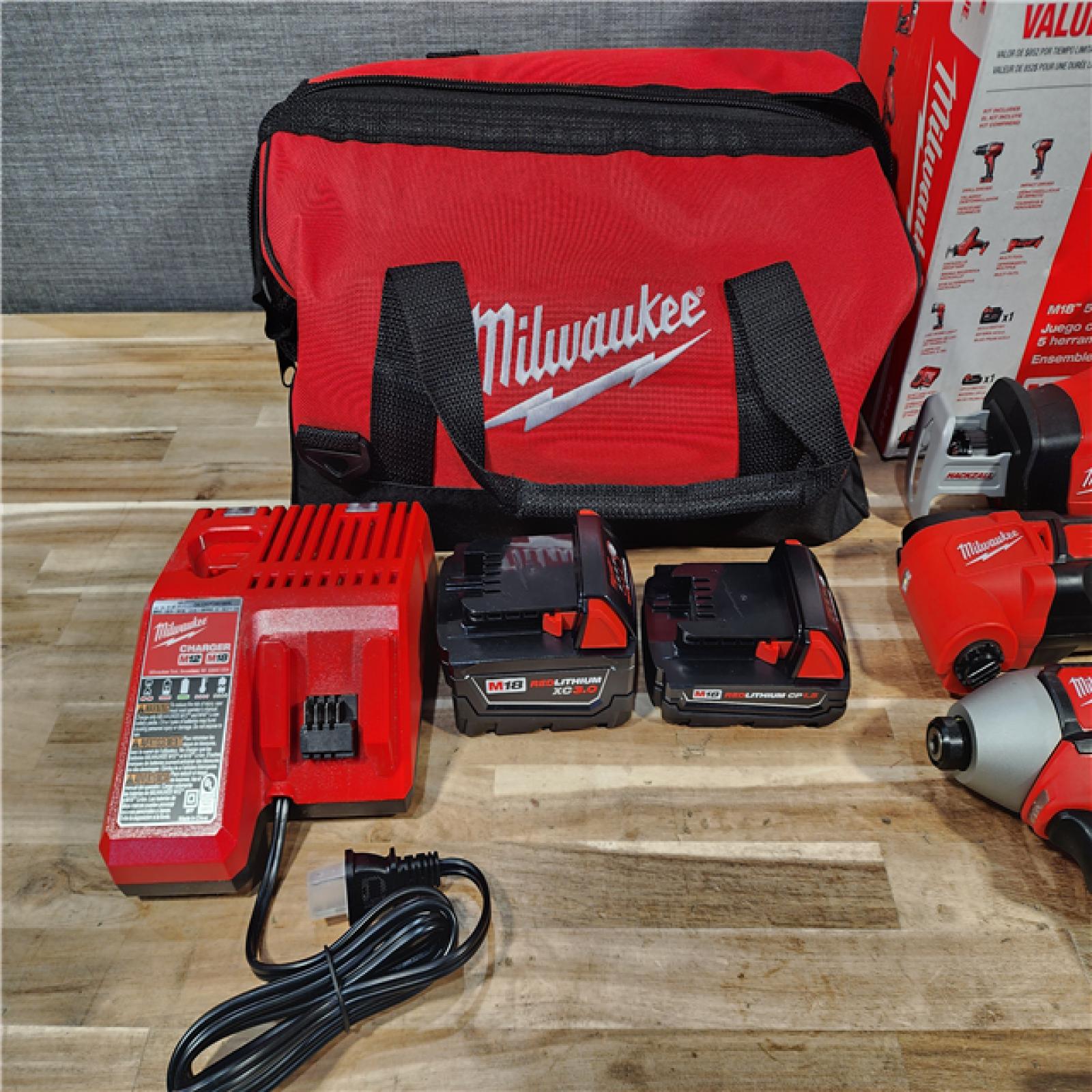 HOUSTON LOCATION - AS-IS M18 18V Lithium-Ion Cordless Combo Kit (5-Tool) with (2) Batteries  Charger and Tool Bag