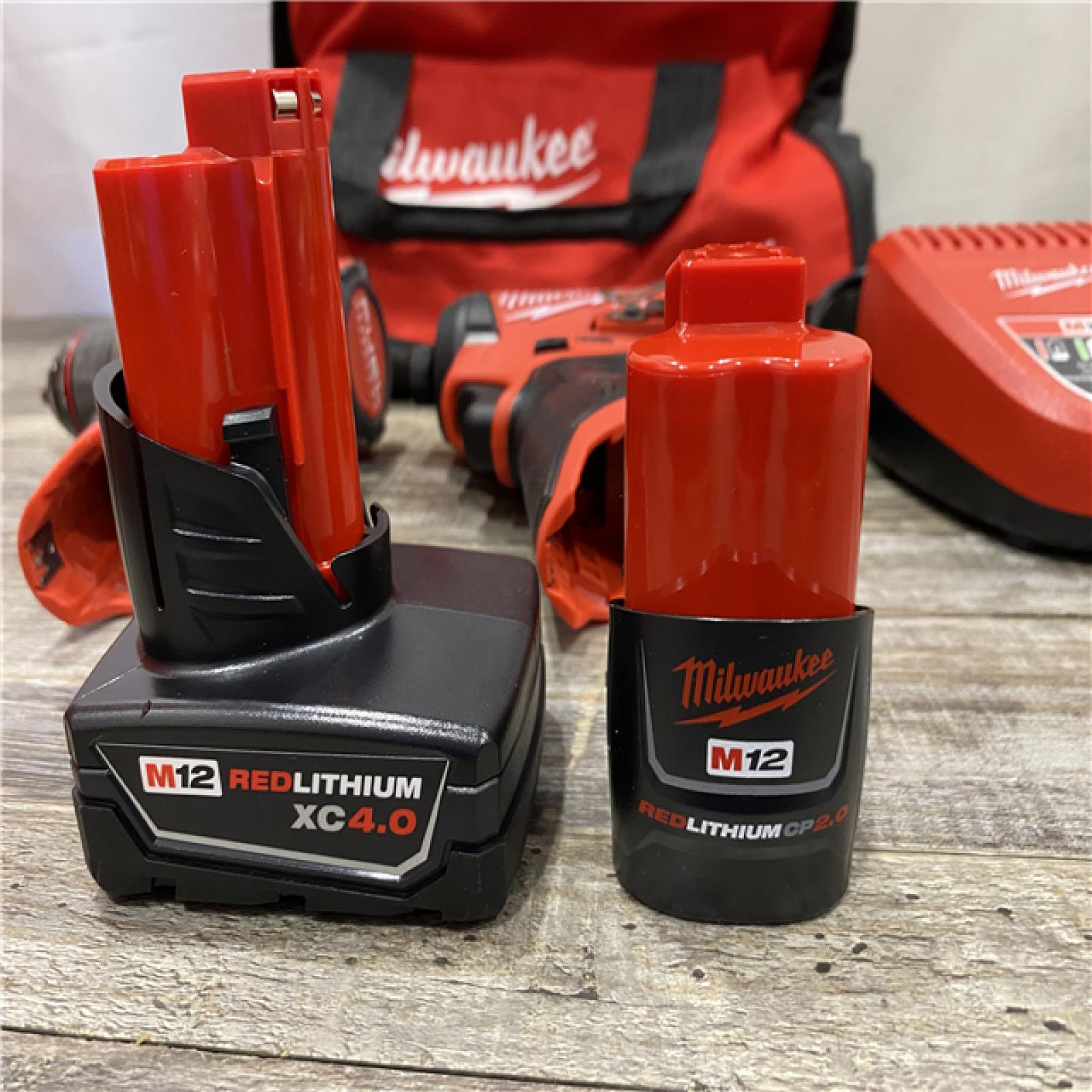 AS-IS Milwaukee FUEL 12-Volt Lithium-Ion Brushless Cordless Hammer Drill and Impact Driver Combo Kit