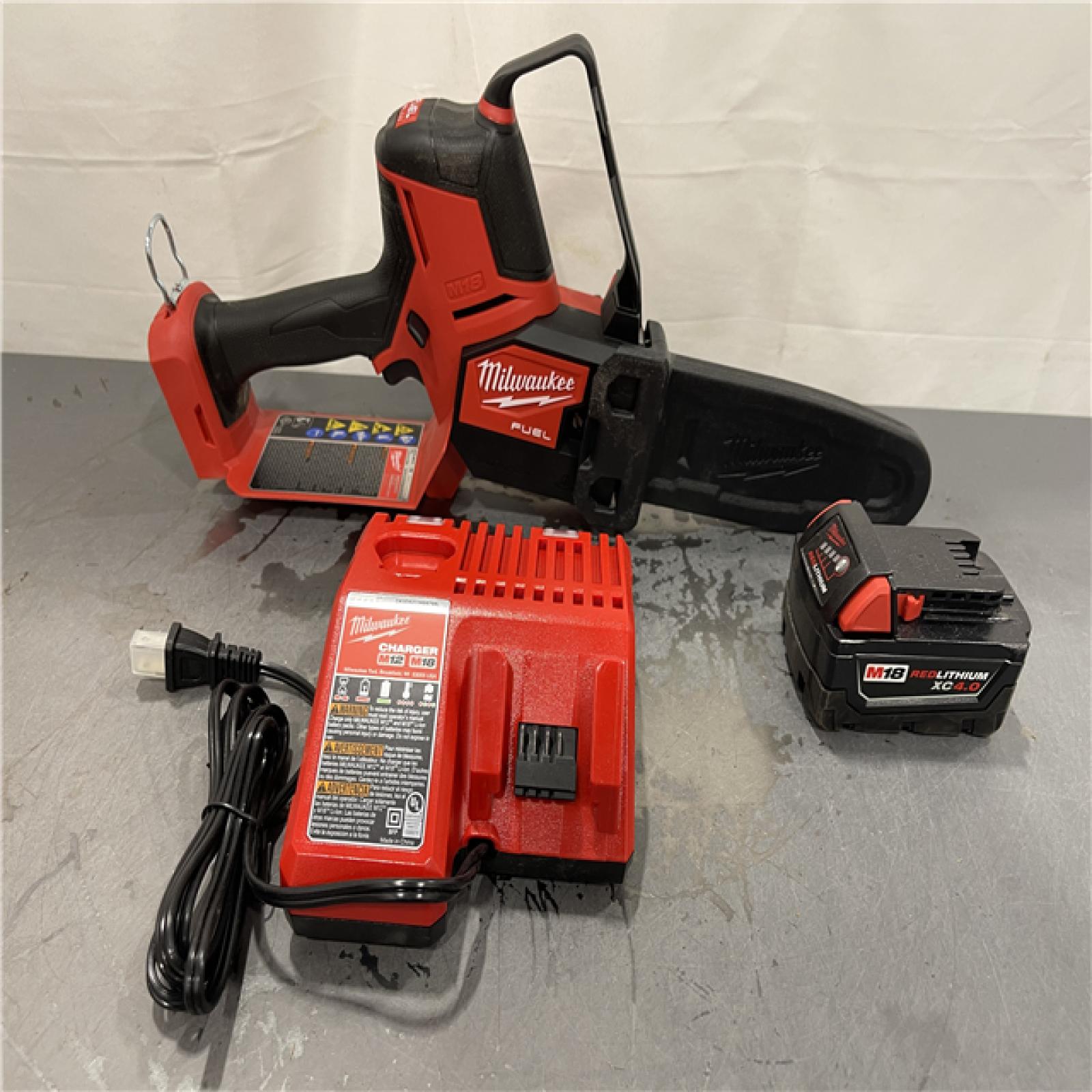 AS-IS - Milwaukee M18 FUEL 8 in. 18V Lithium-Ion Brushless HATCHET Pruning Saw Kit