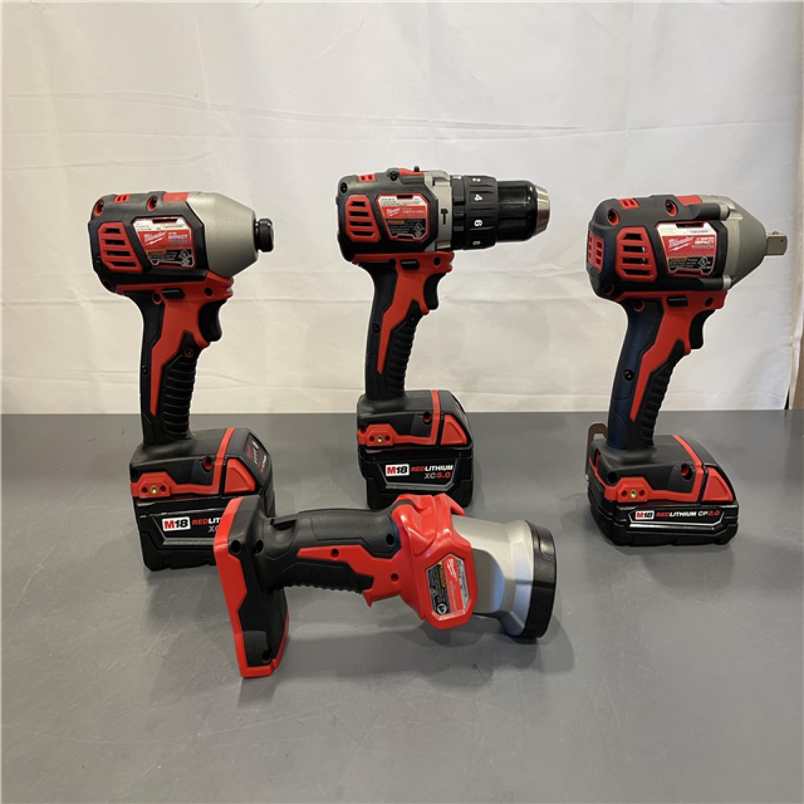 AS-IS - Milwaukee M18 18V Lithium-Ion Cordless Combo Kit (8-Tool) with (3) Batteries, Charger and (2) Tool Bags
